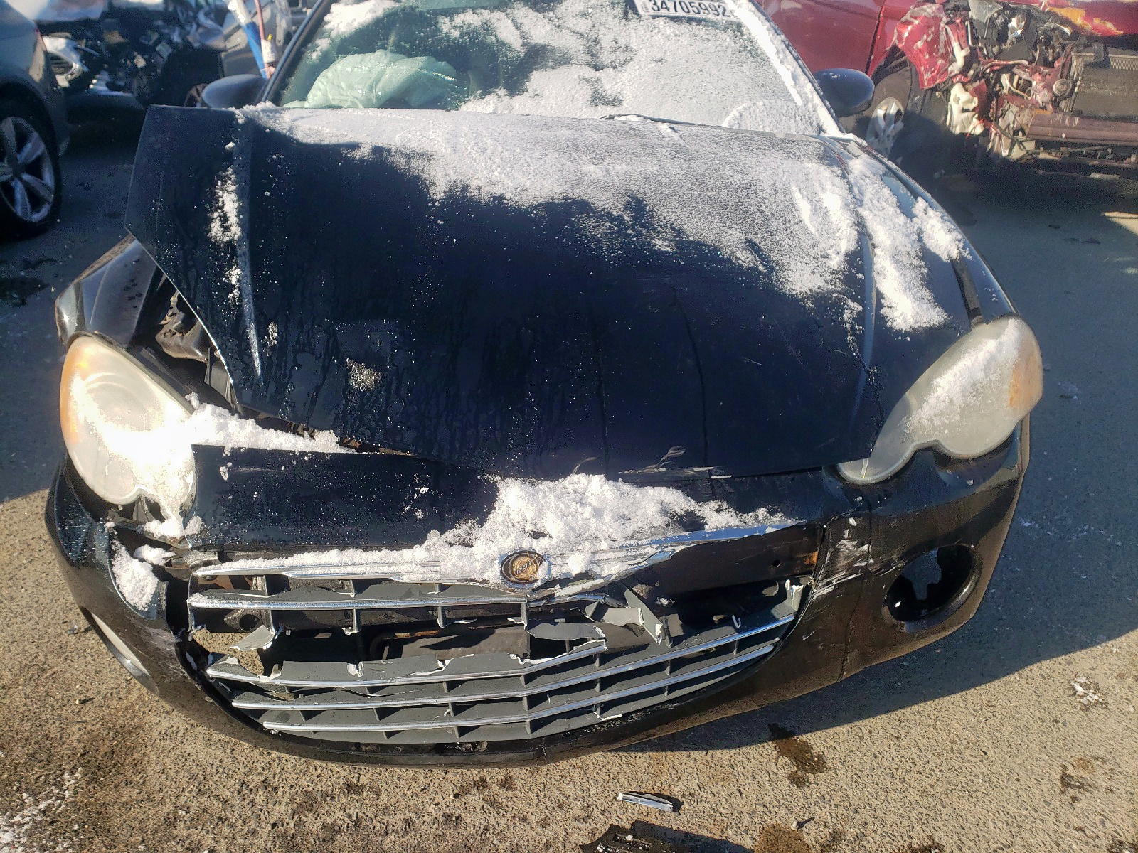Photo 7 from auction – 2004 CHRYSLER SEBRING LI with VIN 4C3AG52H04E129240