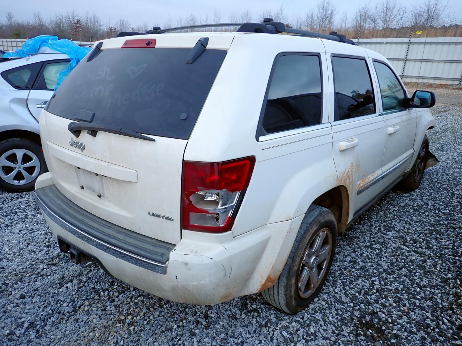 Photo 4 from auction – 2005 JEEP GRAND CHER with VIN 1J4HS58N65C580252