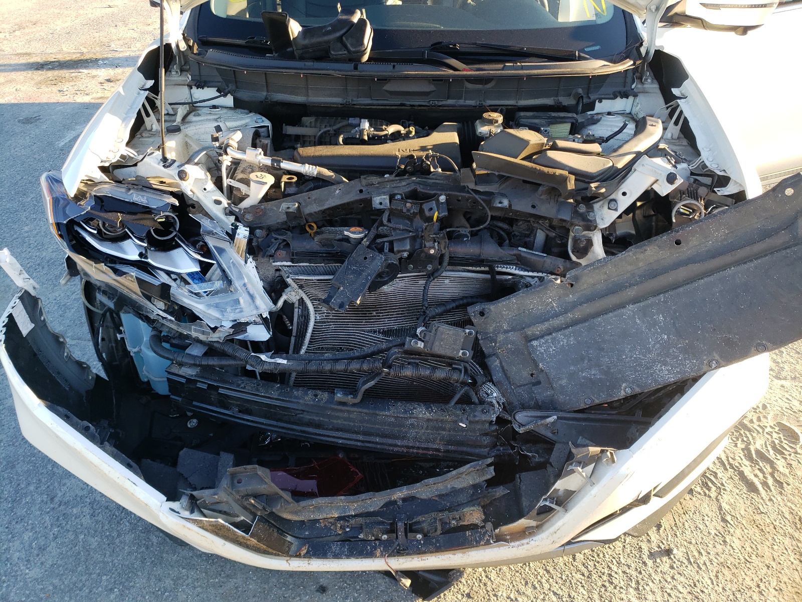 Photo 17 from auction – 2017 NISSAN ROGUE S with VIN 5N1AT2MT6HC761309