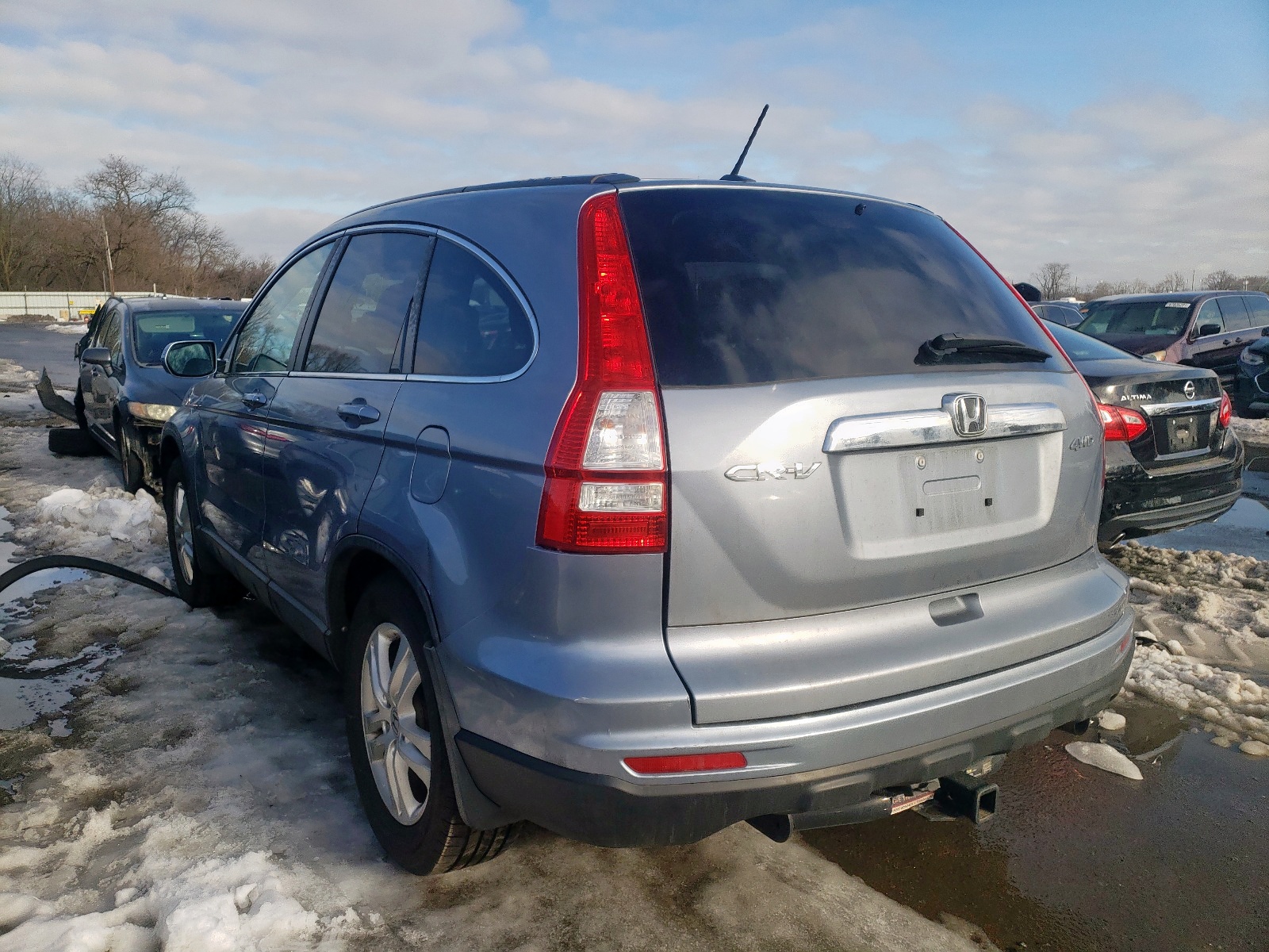 Photo 3 from auction – 2011 HONDA CR-V EXL with VIN 5J6RE4H79BL046536