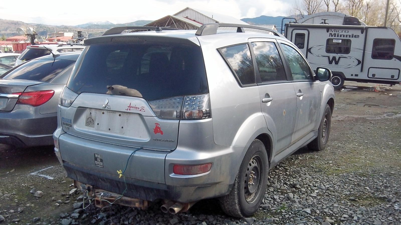Photo 4 from auction – 2011 MITSUBISHI OUTLANDER with VIN JA4JT3AX0BU602279