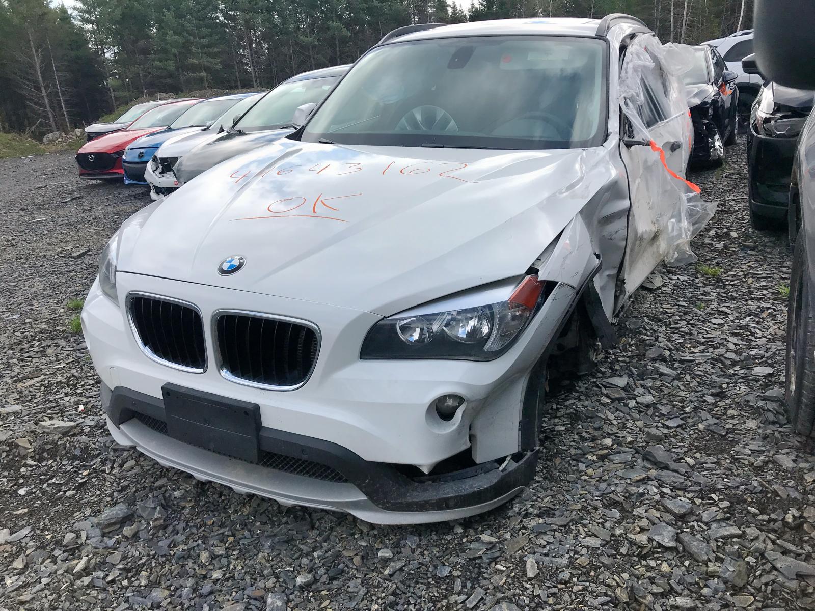 Photo 2 from auction – 2015 BMW X1 XDRIVE2 with VIN WBAVL1C59FVY24842