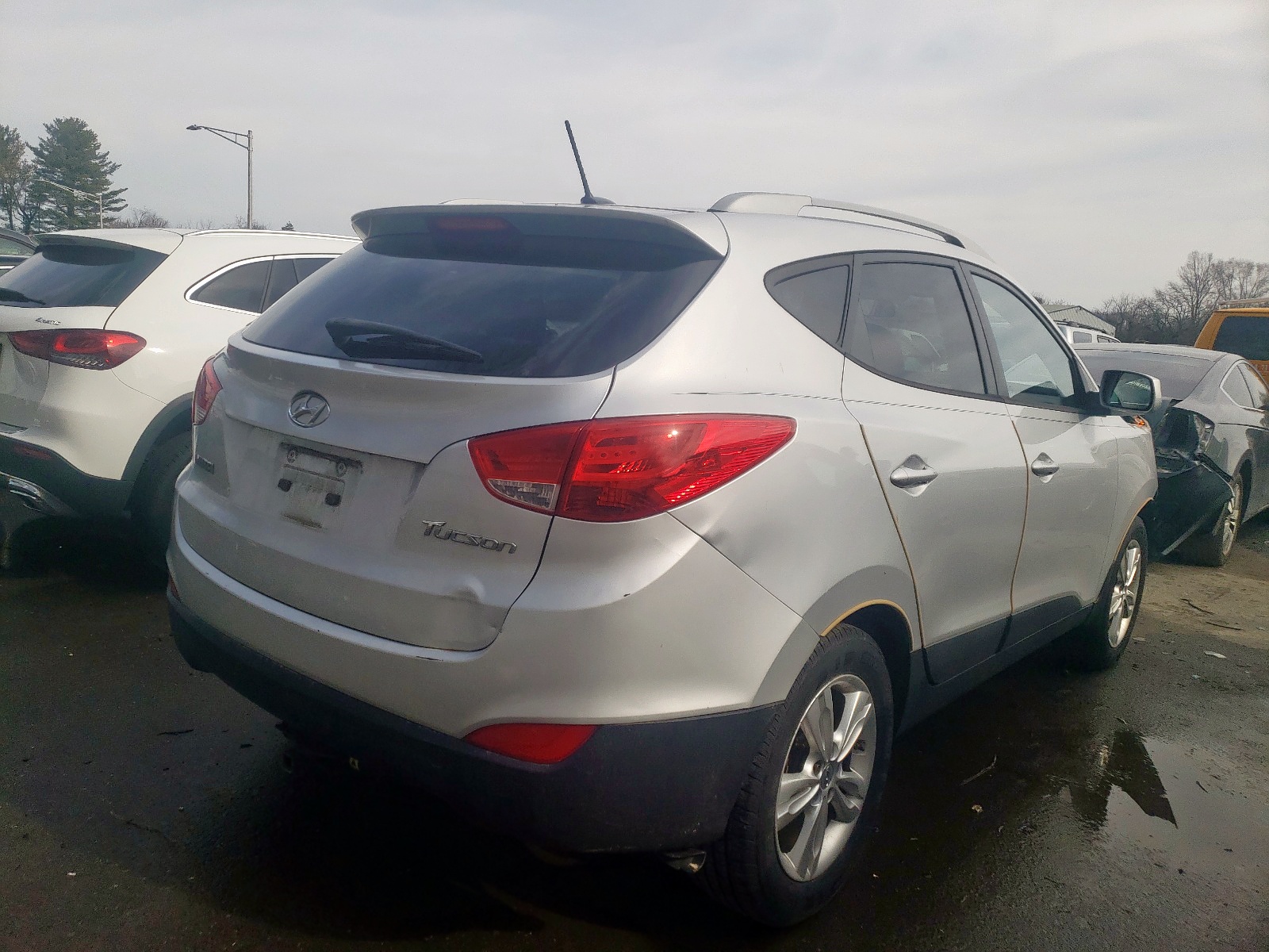 Photo 4 from auction – 2011 HYUNDAI TUCSON GLS with VIN KM8JU3AC8BU290675