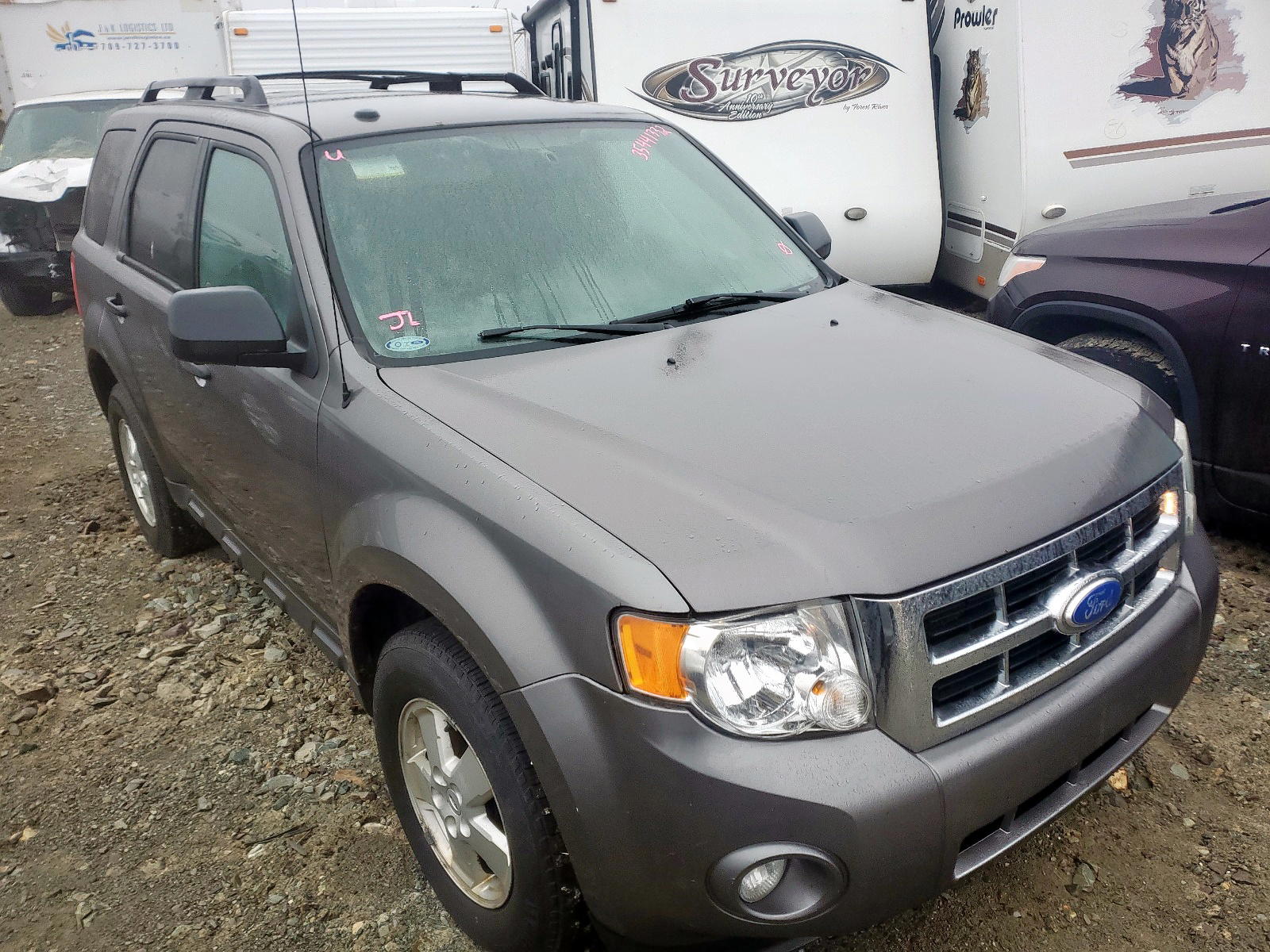 FORD ESCAPE XLT 2011 with VIN 1FMCU0DG4BKC00598 - Photo from auction