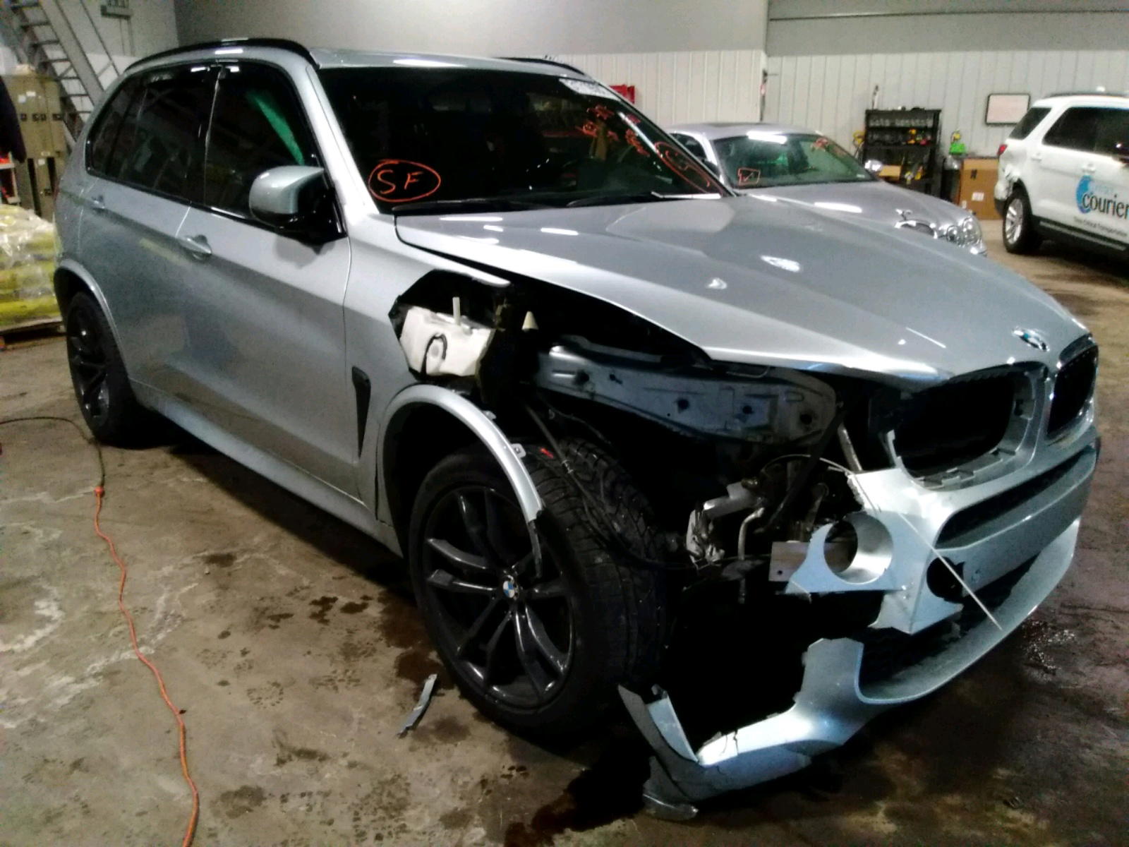 BMW X5 M 2016 with VIN 5YMKT6C52G0R79242 - Photo from auction