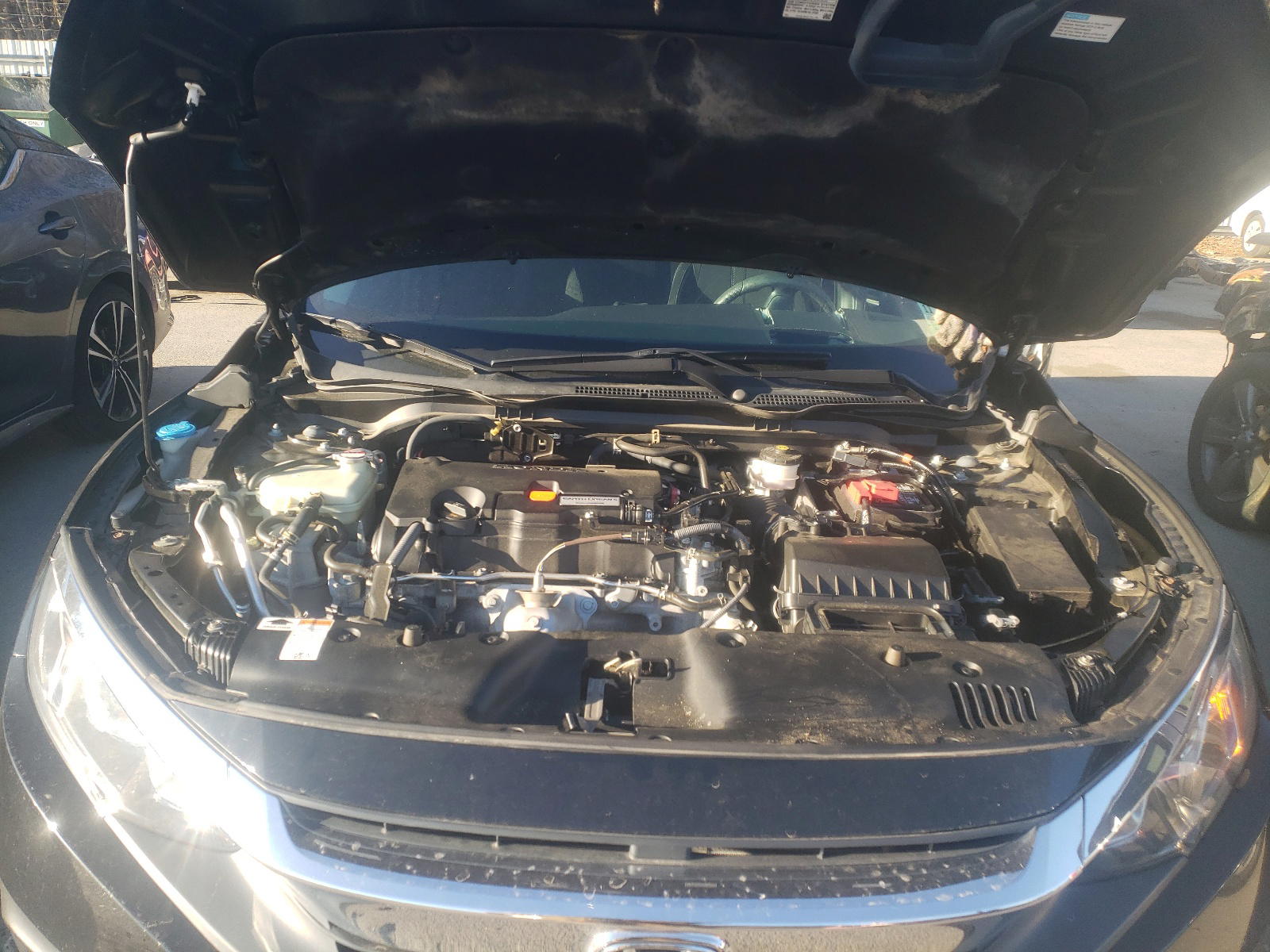 Photo 7 from auction – 2017 HONDA CIVIC LX with VIN 2HGFC2F58HH543718