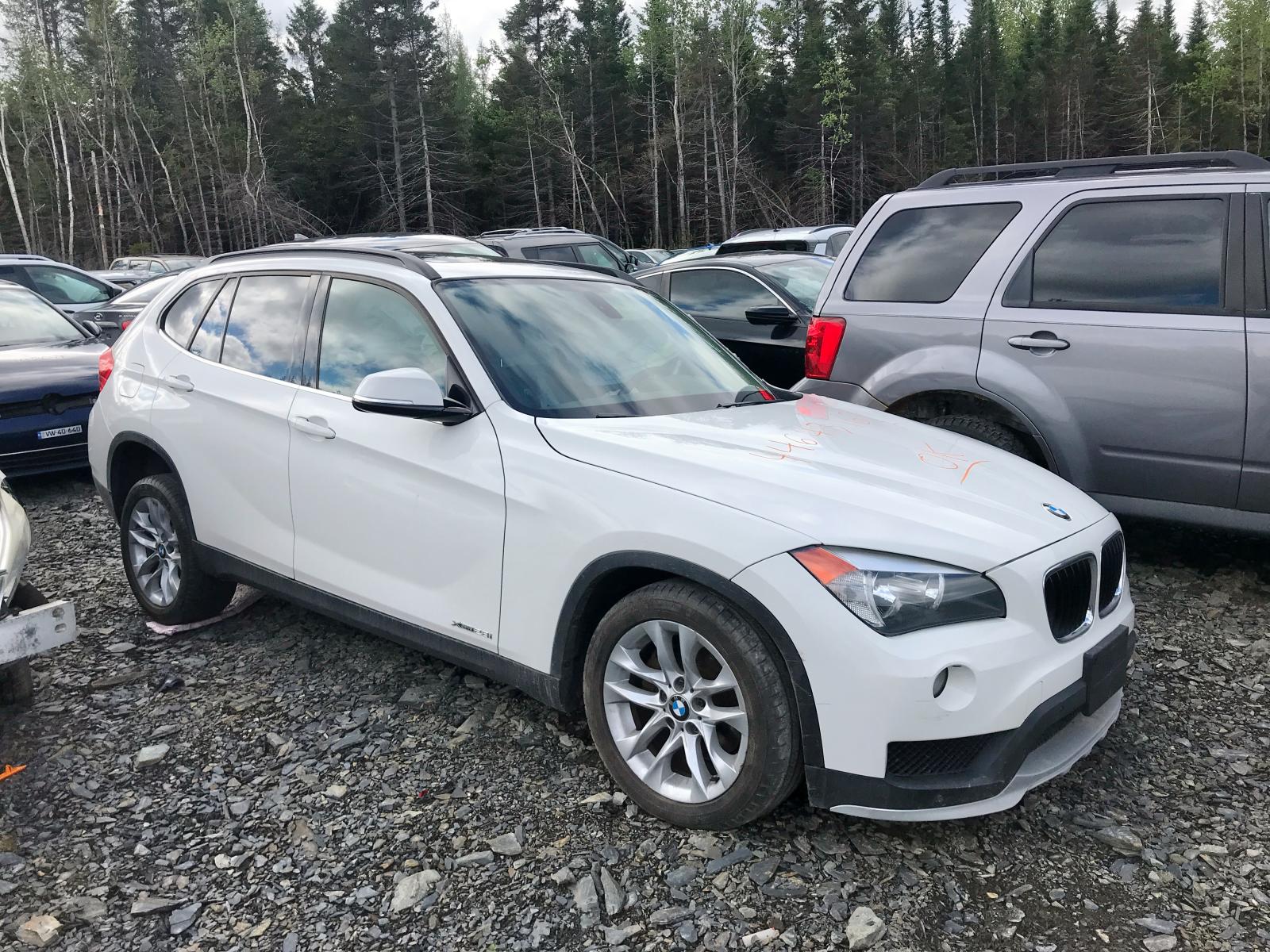 BMW X1 XDRIVE2 2015 with VIN WBAVL1C59FVY24842 - Photo from auction