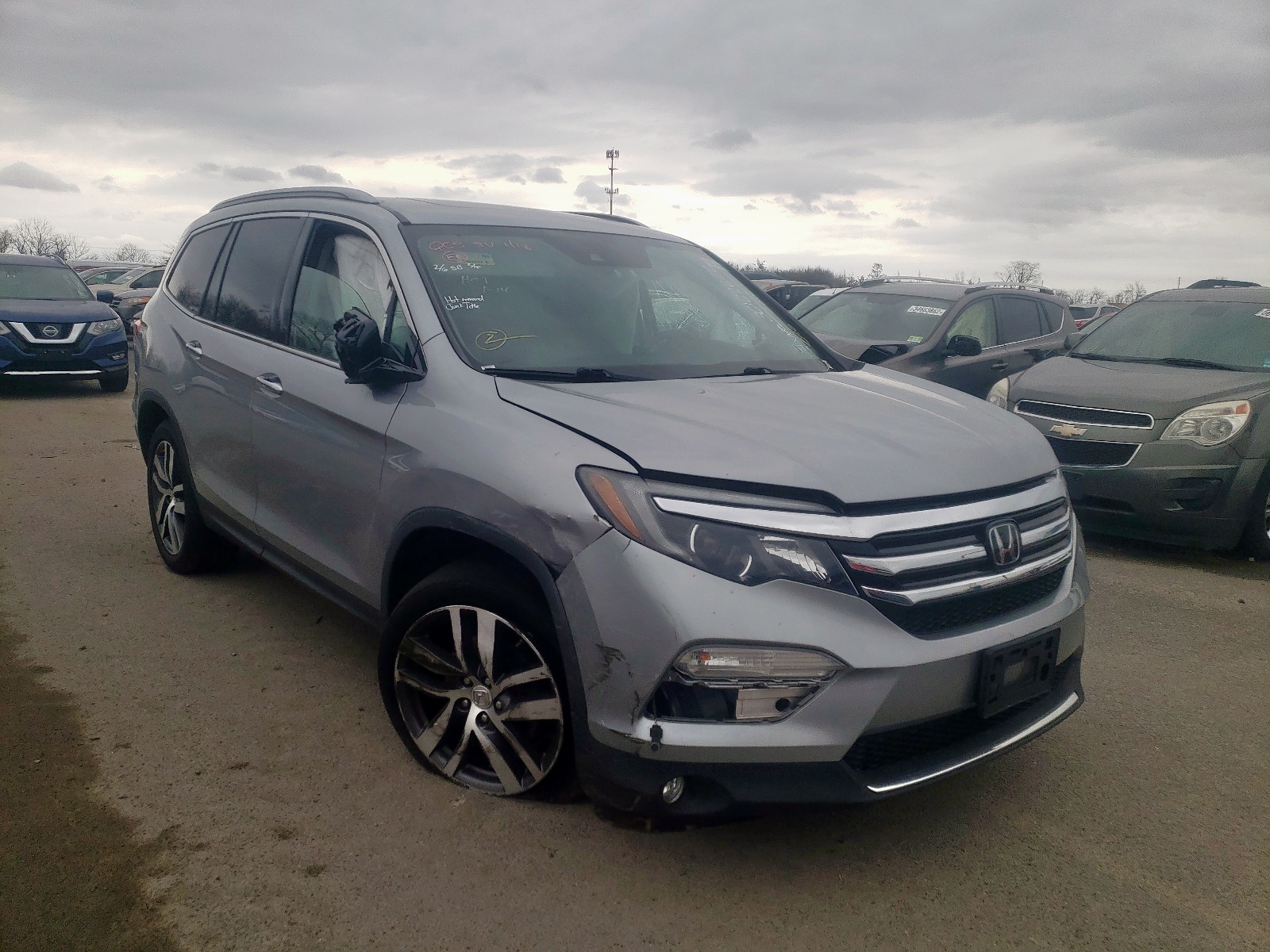 Photo 1 from auction – 2017 HONDA PILOT TOUR with VIN 5FNYF5H93HB009757