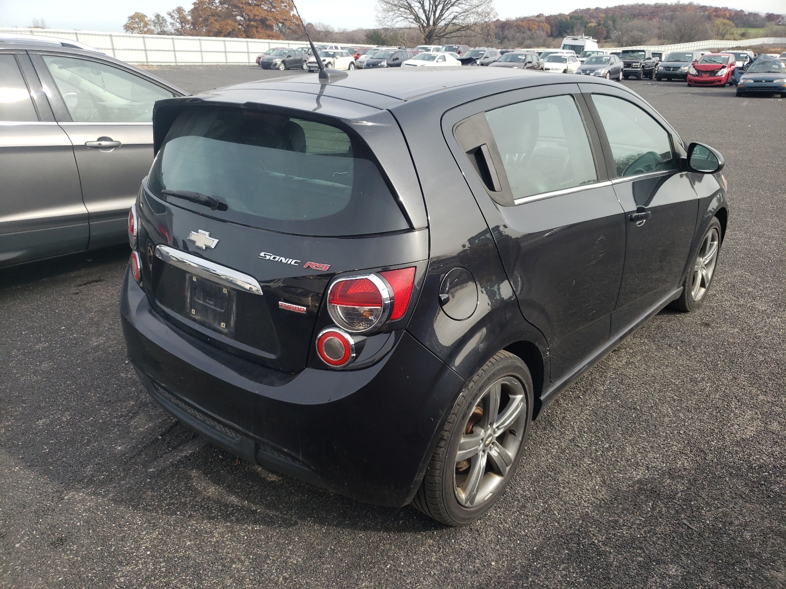 Photo 4 from auction – 2013 CHEVROLET SONIC RS with VIN 1G1JH6SB7D4225229