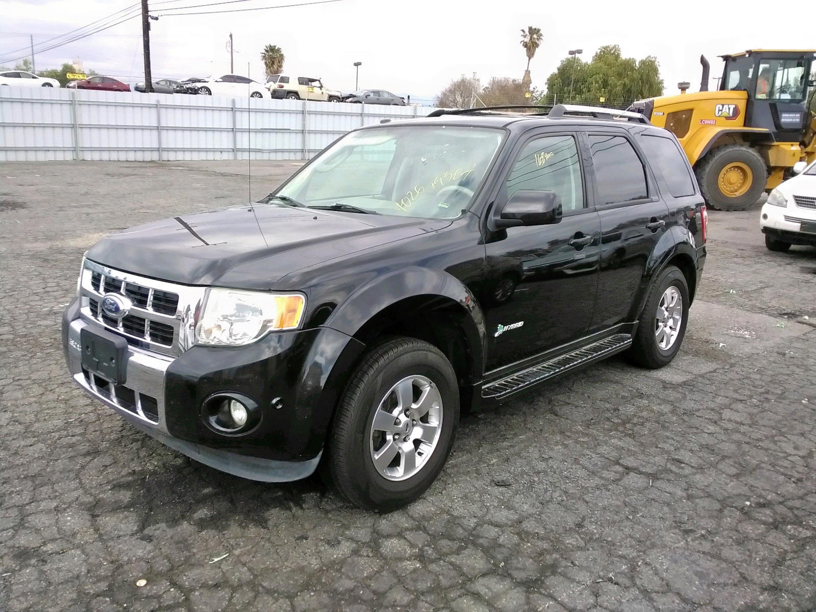 Photo 2 from auction – 2011 FORD ESCAPE HYB with VIN 1FMCU4K38BKB59710