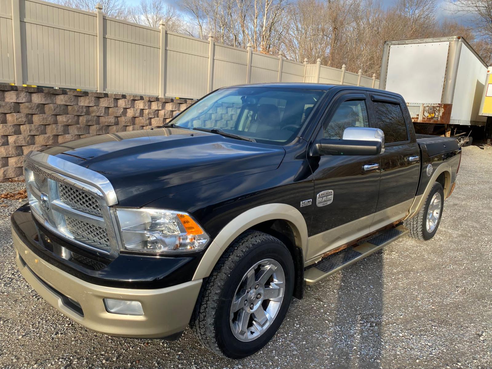 Photo 2 from auction – 2011 DODGE RAM 1500 with VIN 1D7RV1CT4BS593329