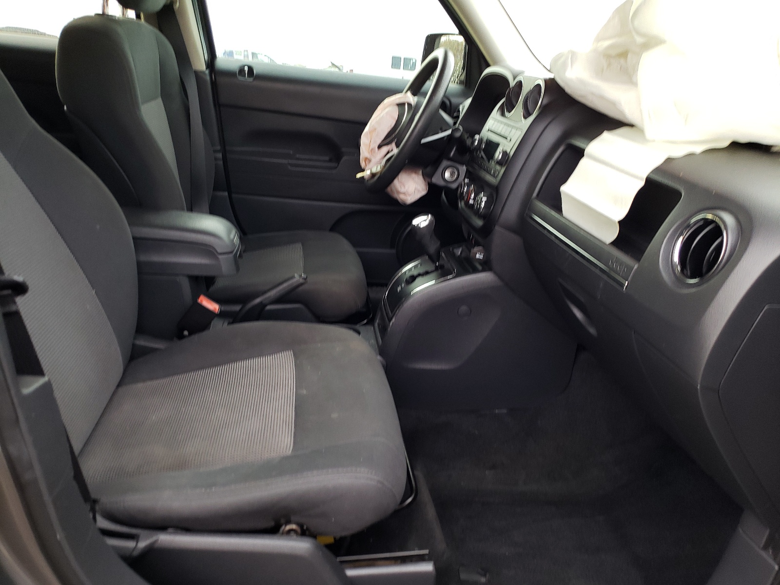 Photo 5 from auction – 2012 JEEP PATRIOT SP with VIN 1C4NJPBA9CD673755