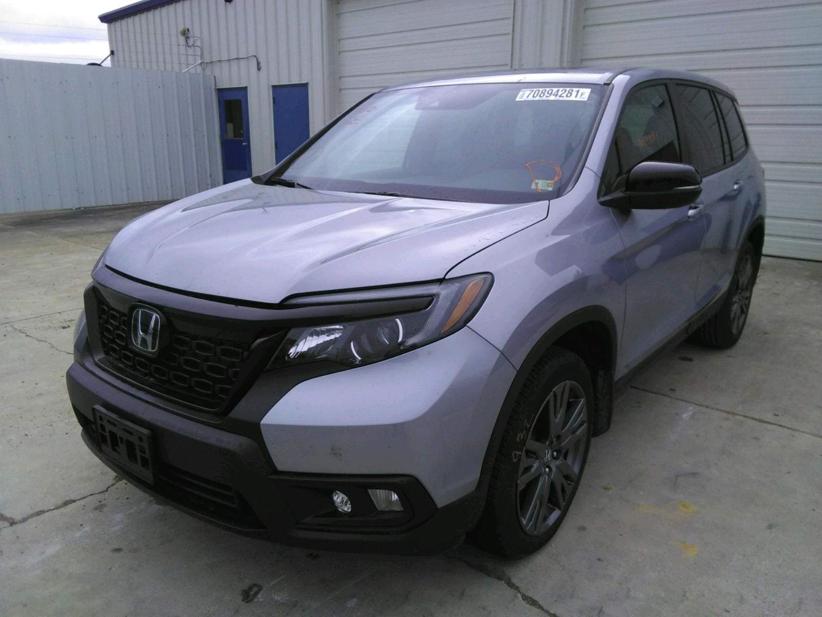 Photo 2 from auction – 2020 HONDA PASSPORT E with VIN 5FNYF7H56LB004375