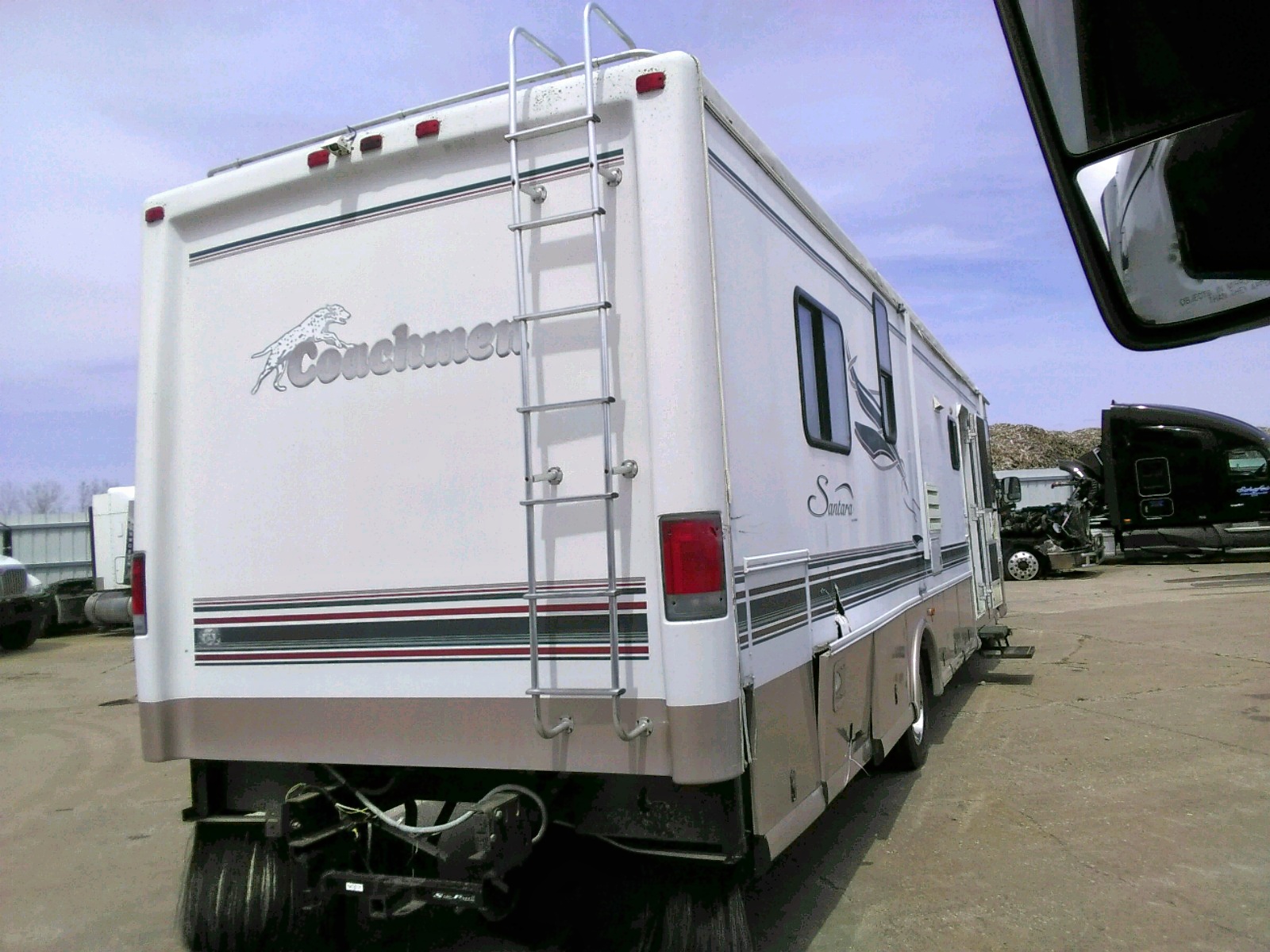 Photo 4 from auction – 1999 COACH SANTARA with VIN 3FCNF53S4XJA23658