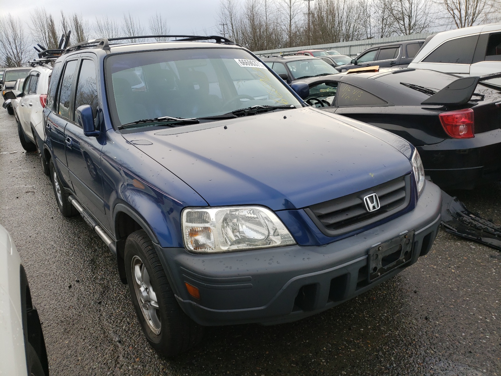 Photo 1 from auction – 1998 HONDA CR-V EX with VIN JHLRD1869WC040310