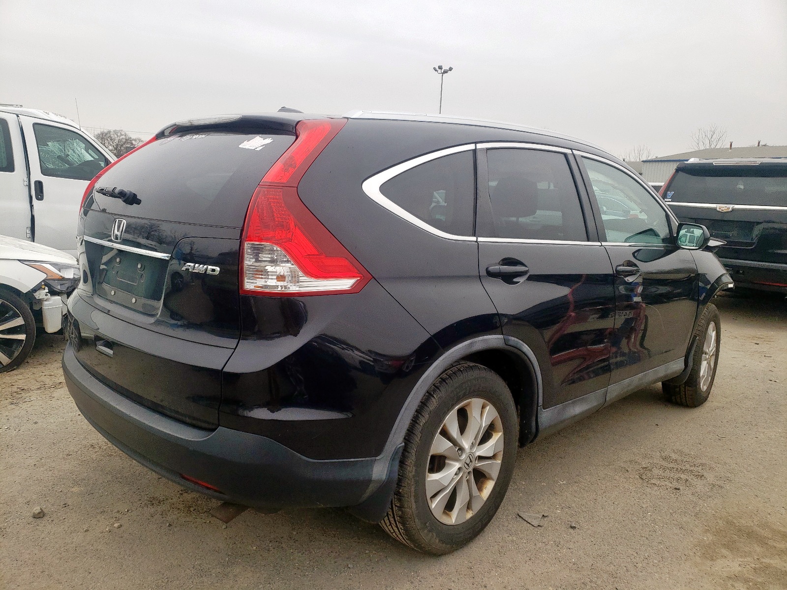 Photo 4 from auction – 2014 HONDA CR-V EXL with VIN 2HKRM4H79EH652209