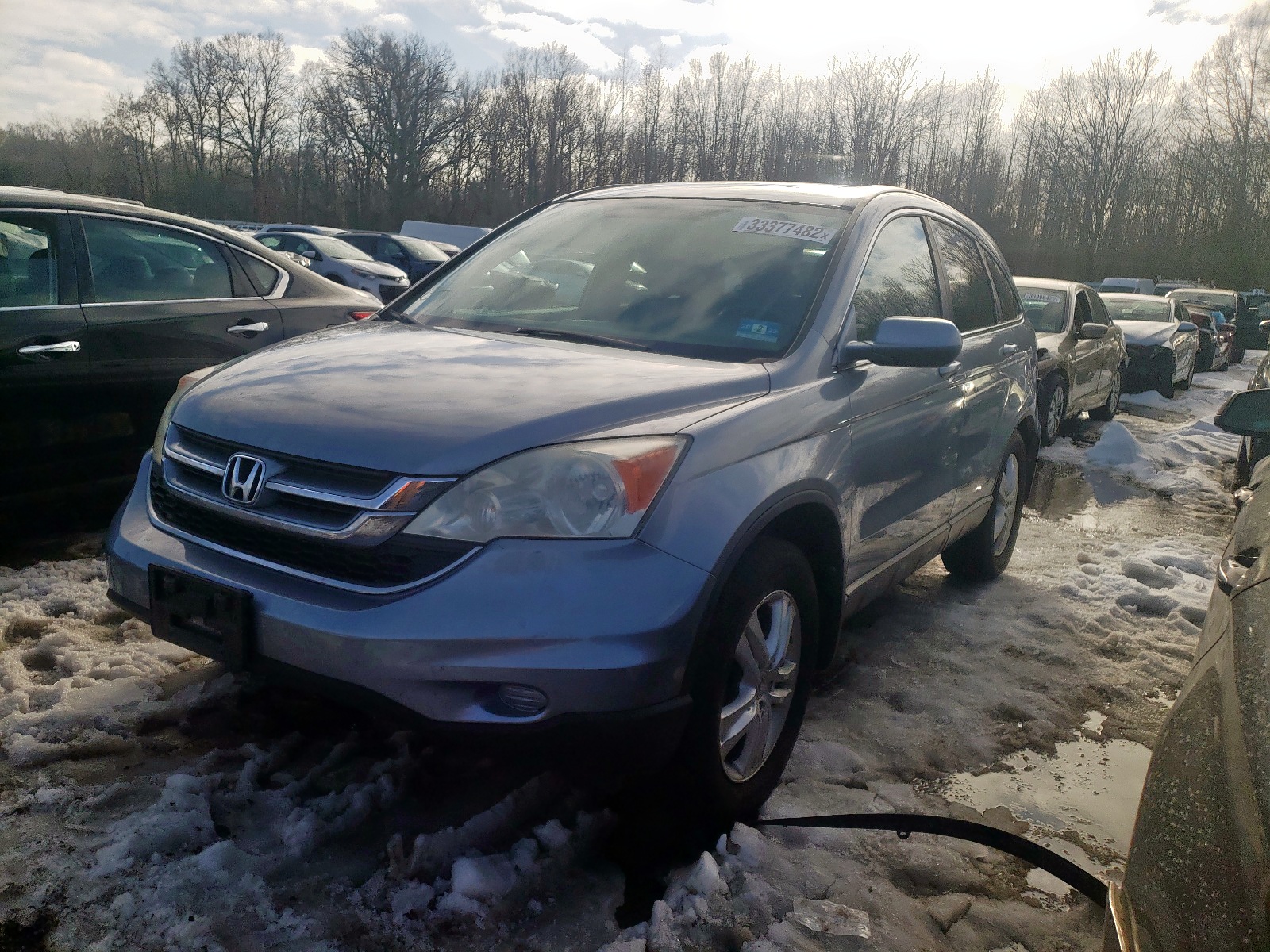 Photo 2 from auction – 2011 HONDA CR-V EXL with VIN 5J6RE4H79BL046536