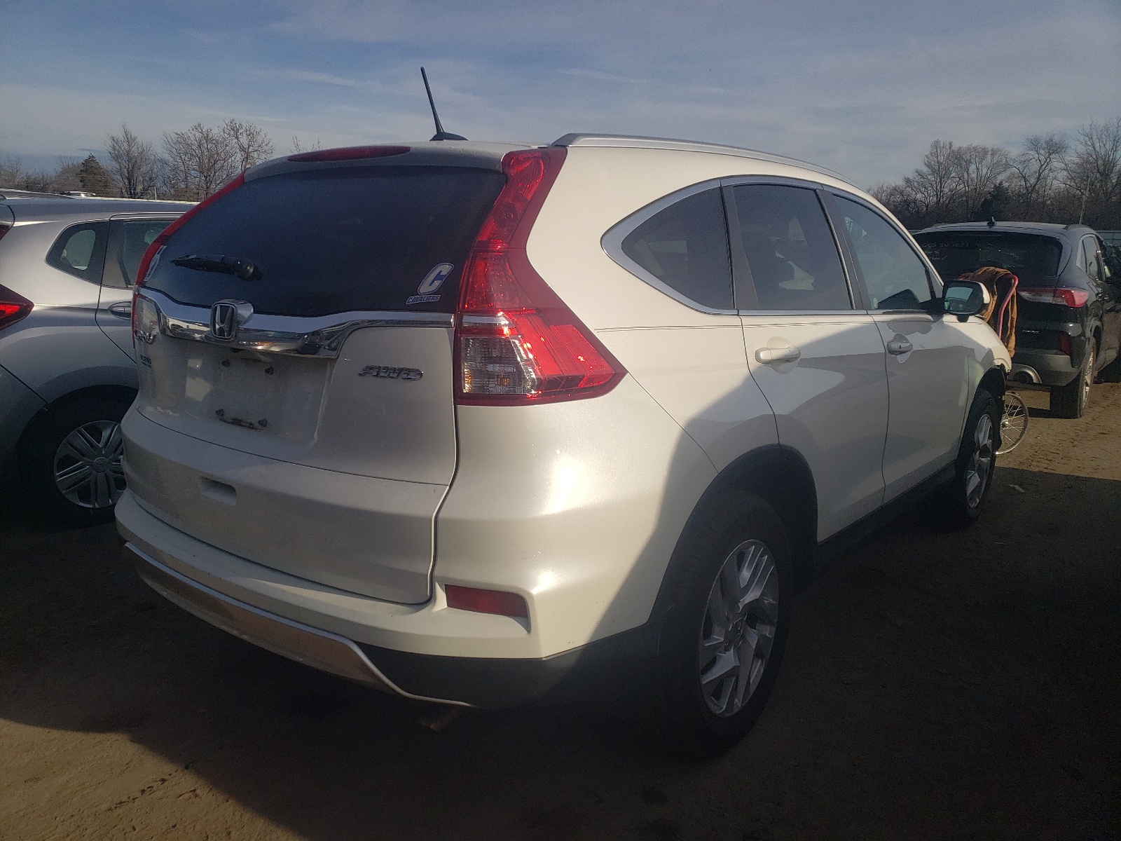 Photo 4 from auction – 2015 HONDA CR-V EXL with VIN 5J6RM4H70FL115249