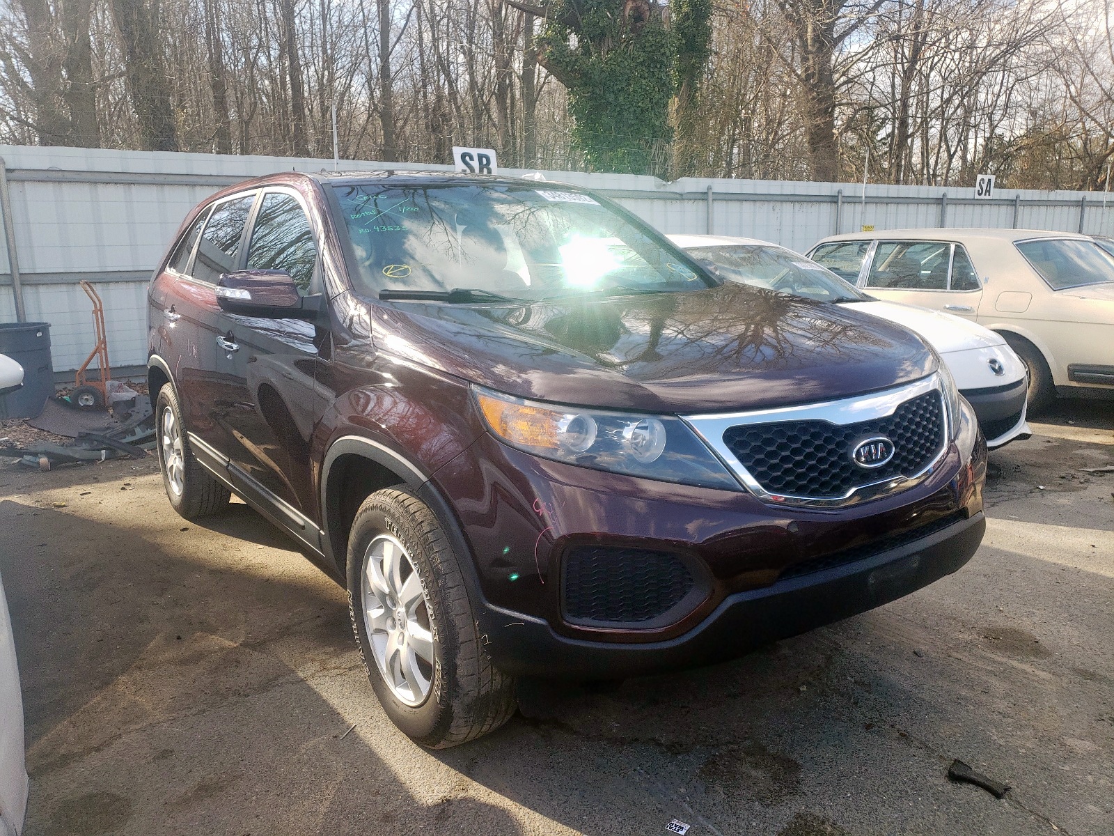 KIA SORENTO LX 2013 with VIN 5XYKT3A18DG325620 - Photo from auction