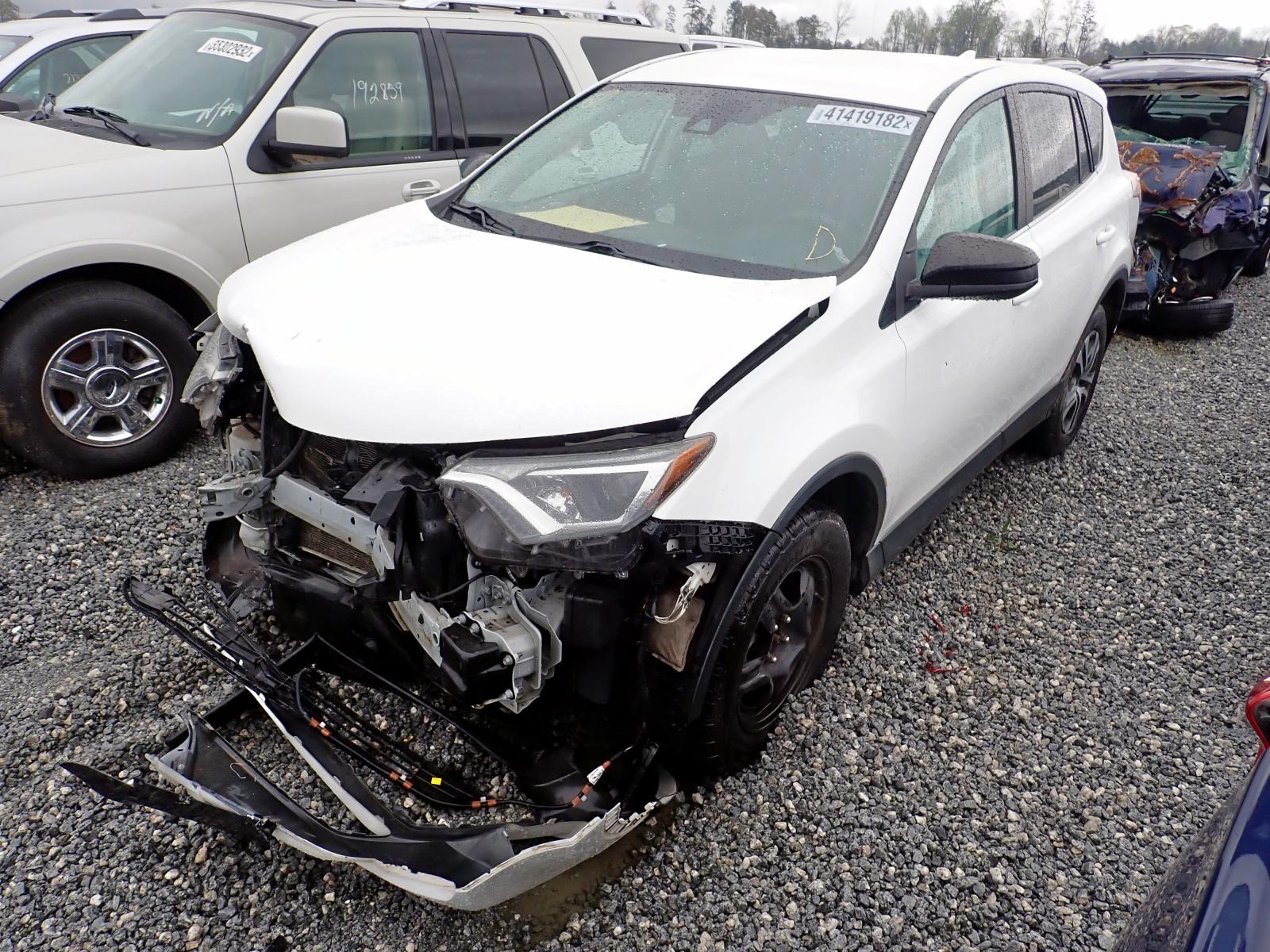 Photo 2 from auction – 2018 TOYOTA RAV4 LE with VIN 2T3BFREV1JW701319