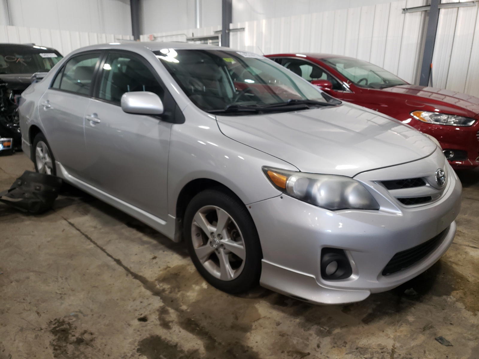 TOYOTA COROLLA BA 2011 with VIN 2T1BU4EEXBC642971 - Photo from auction