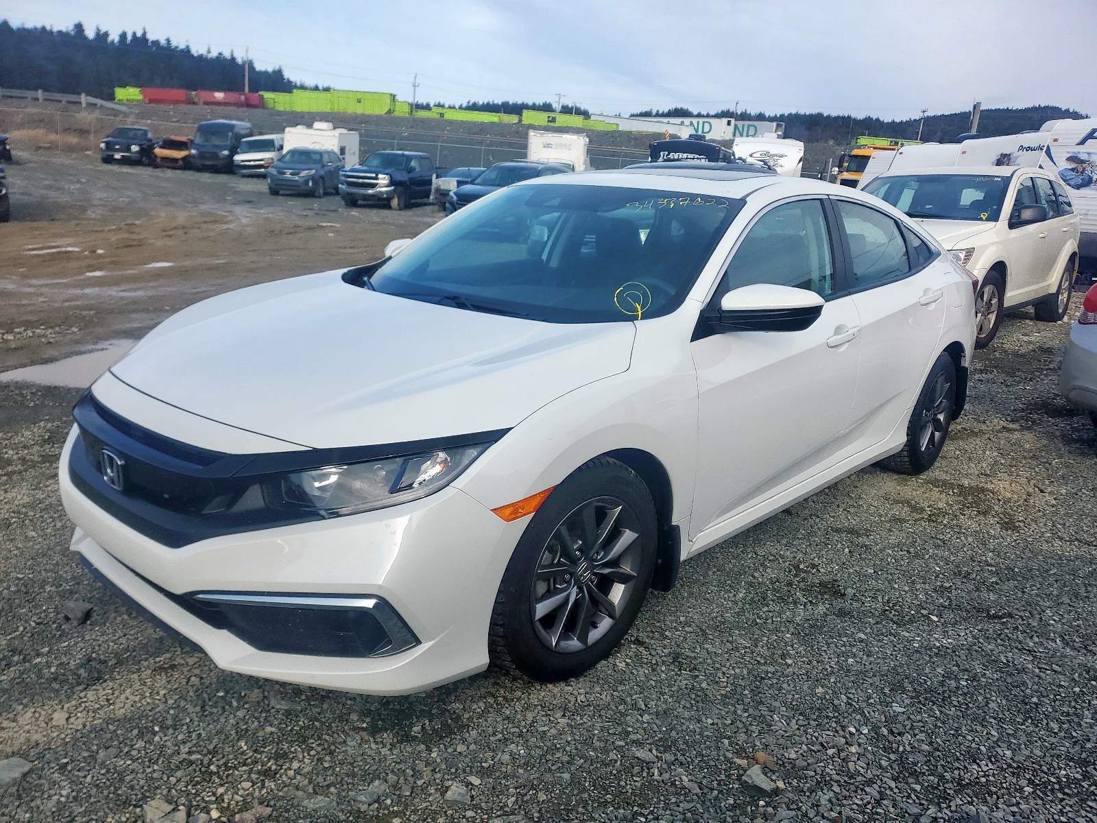 Photo 2 from auction – 2021 HONDA CIVIC EX with VIN 2HGFC2F76MH004252