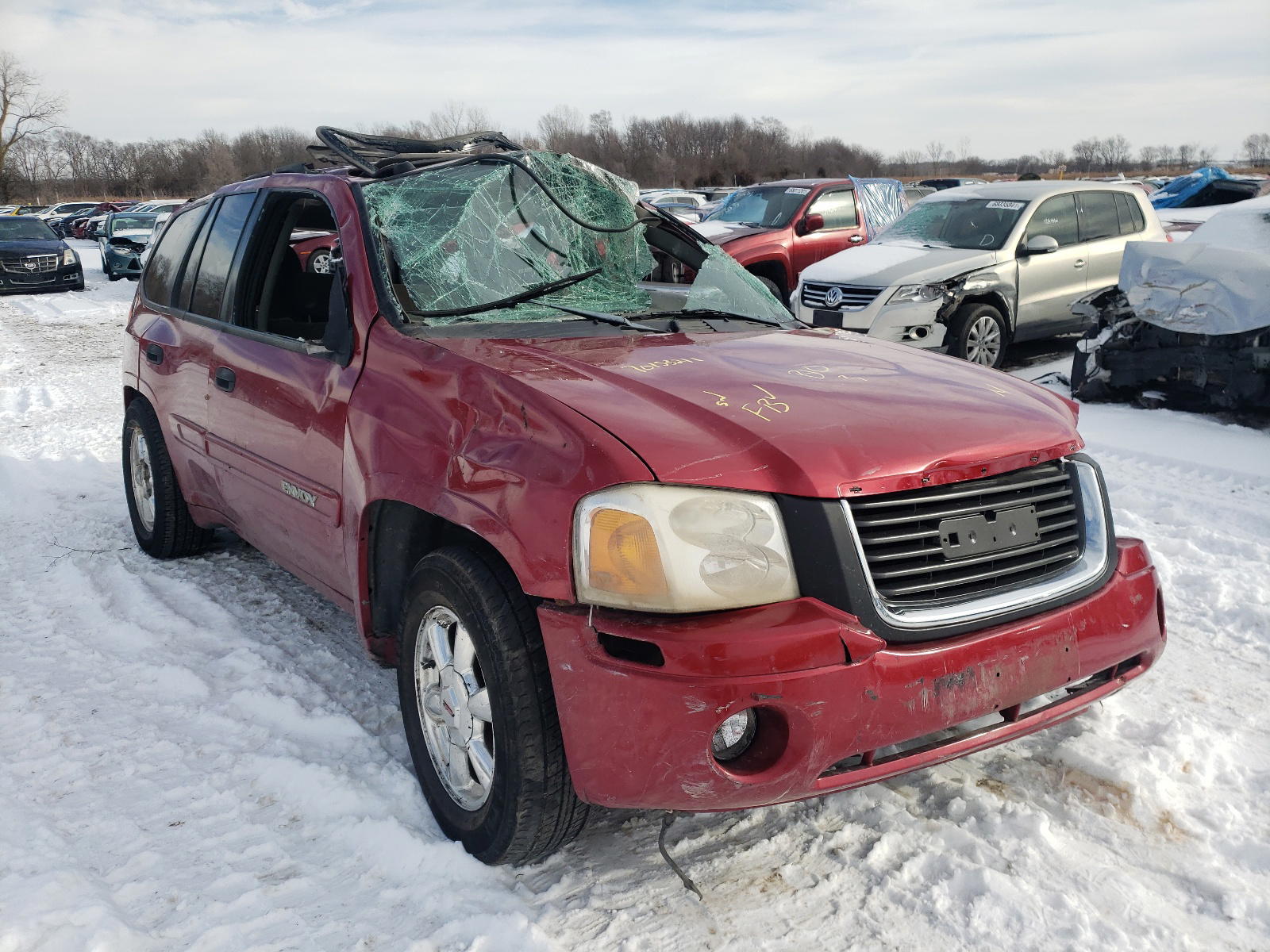 GMC ENVOY 2004 with VIN 1GKDT13SX42370432 - Photo from auction