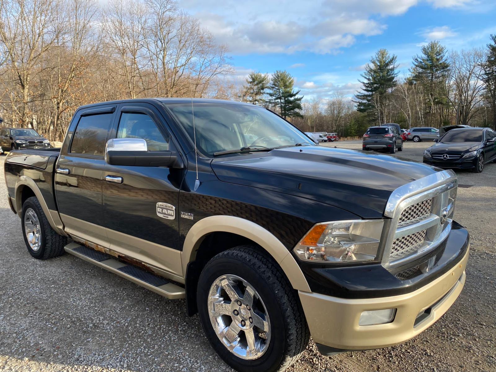 DODGE RAM 1500 2011 with VIN 1D7RV1CT4BS593329 - Photo from auction