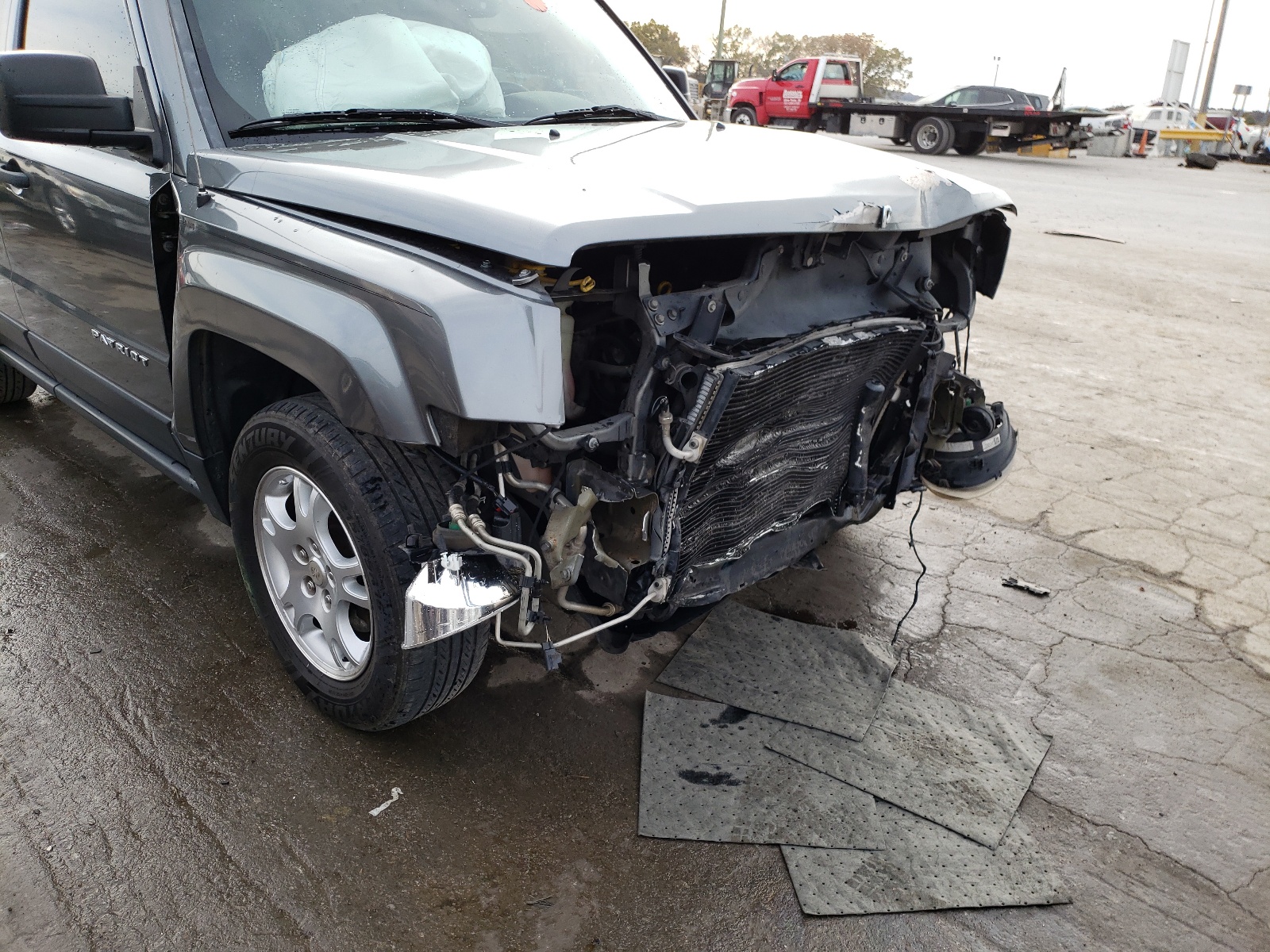 Photo 9 from auction – 2012 JEEP PATRIOT SP with VIN 1C4NJPBA9CD673755