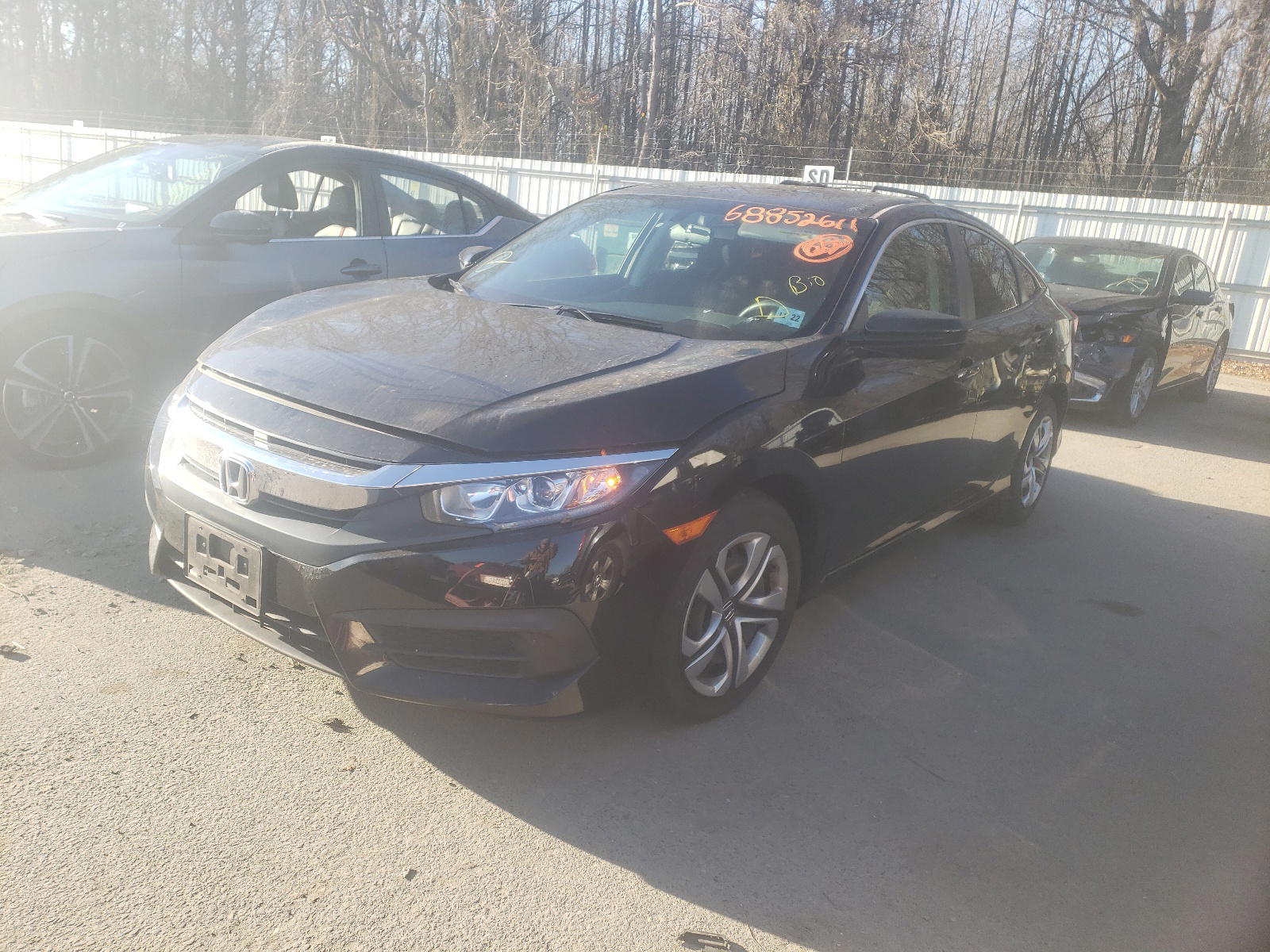 Photo 2 from auction – 2017 HONDA CIVIC LX with VIN 2HGFC2F58HH543718