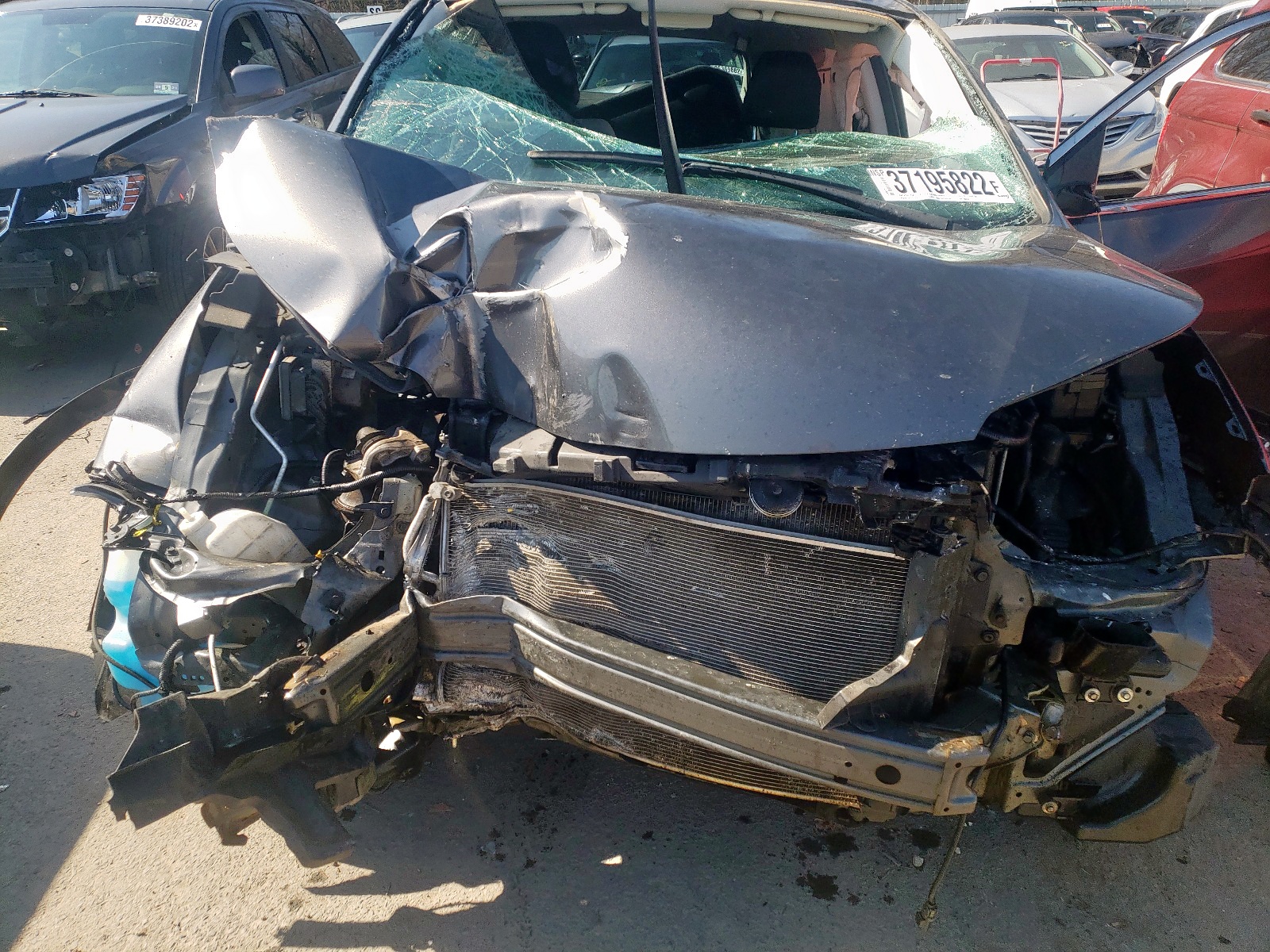 Photo 7 from auction – 2014 HONDA CR-V LX with VIN 2HKRM4H33EH688555