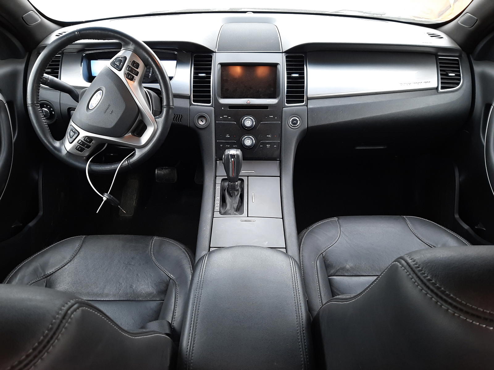 Photo 9 from auction – 2013 FORD TAURUS SEL with VIN 1FAHP2E83DG229770