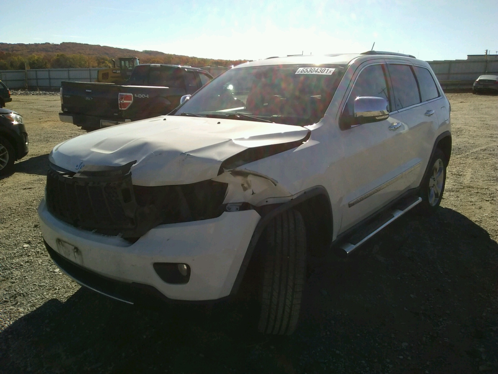 Photo 2 from auction – 2011 JEEP GRAND CHER with VIN 1J4RR6GT9BC560255