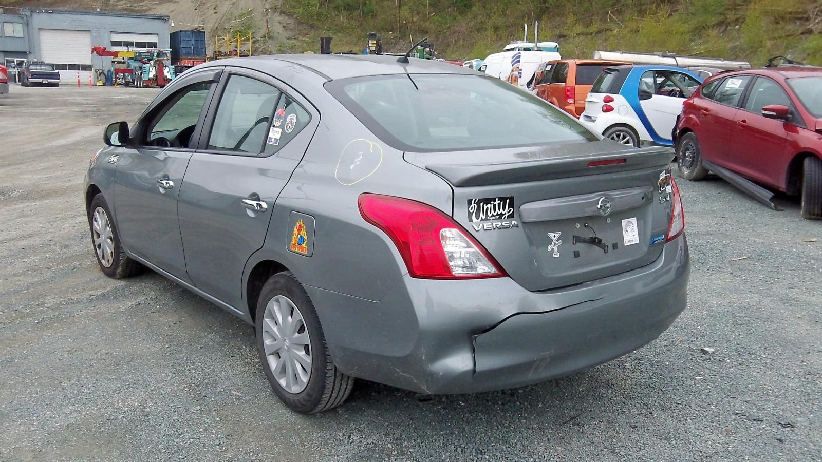 Photo 19 from auction – 2013 NISSAN VERSA S with VIN 3N1CN7AP3DL876284