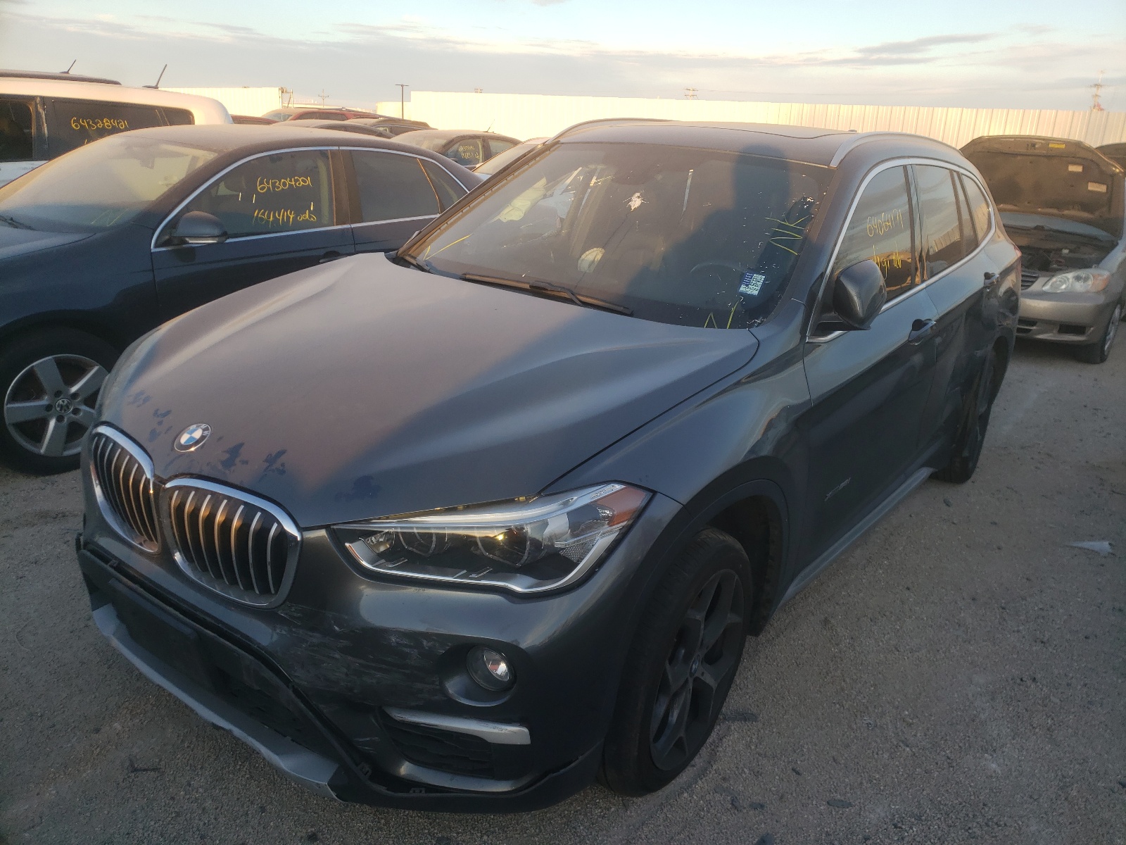 Photo 2 from auction – 2017 BMW X1 XDRIVE2 with VIN WBXHT3C35H5F70288