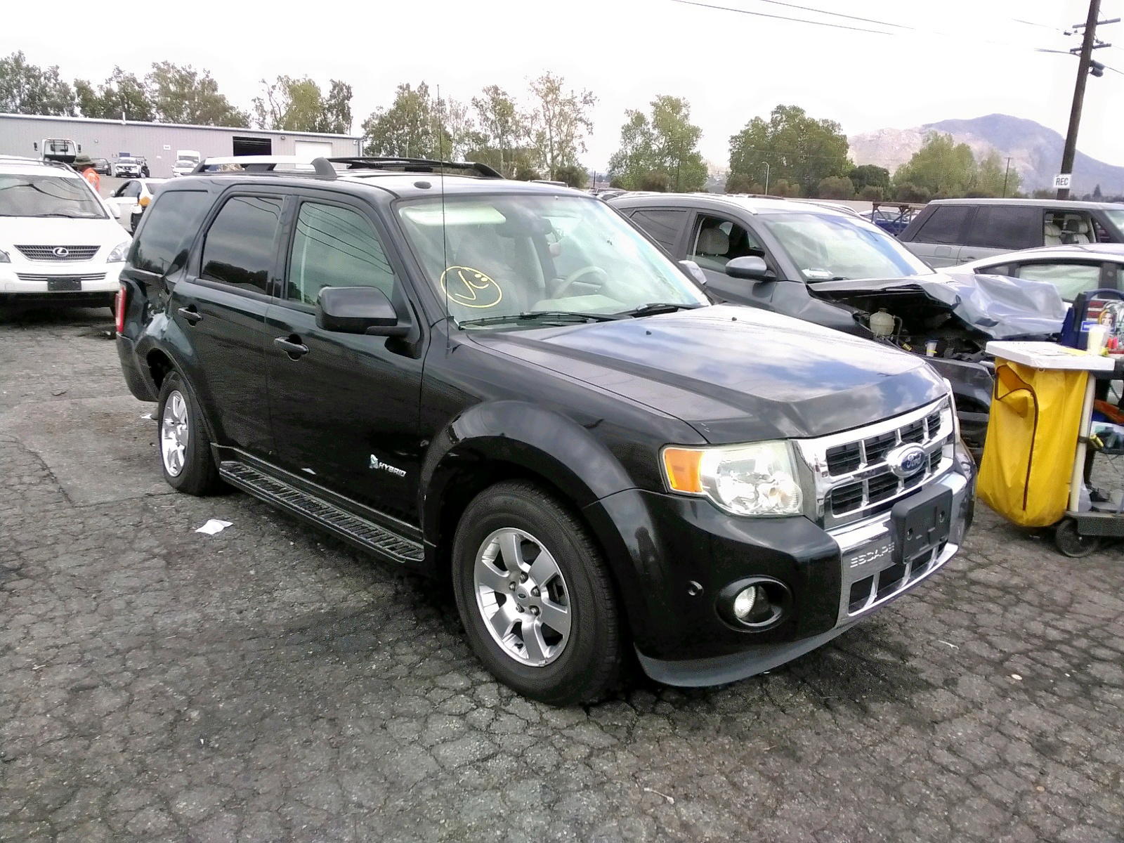 FORD ESCAPE HYB 2011 with VIN 1FMCU4K38BKB59710 - Photo from auction