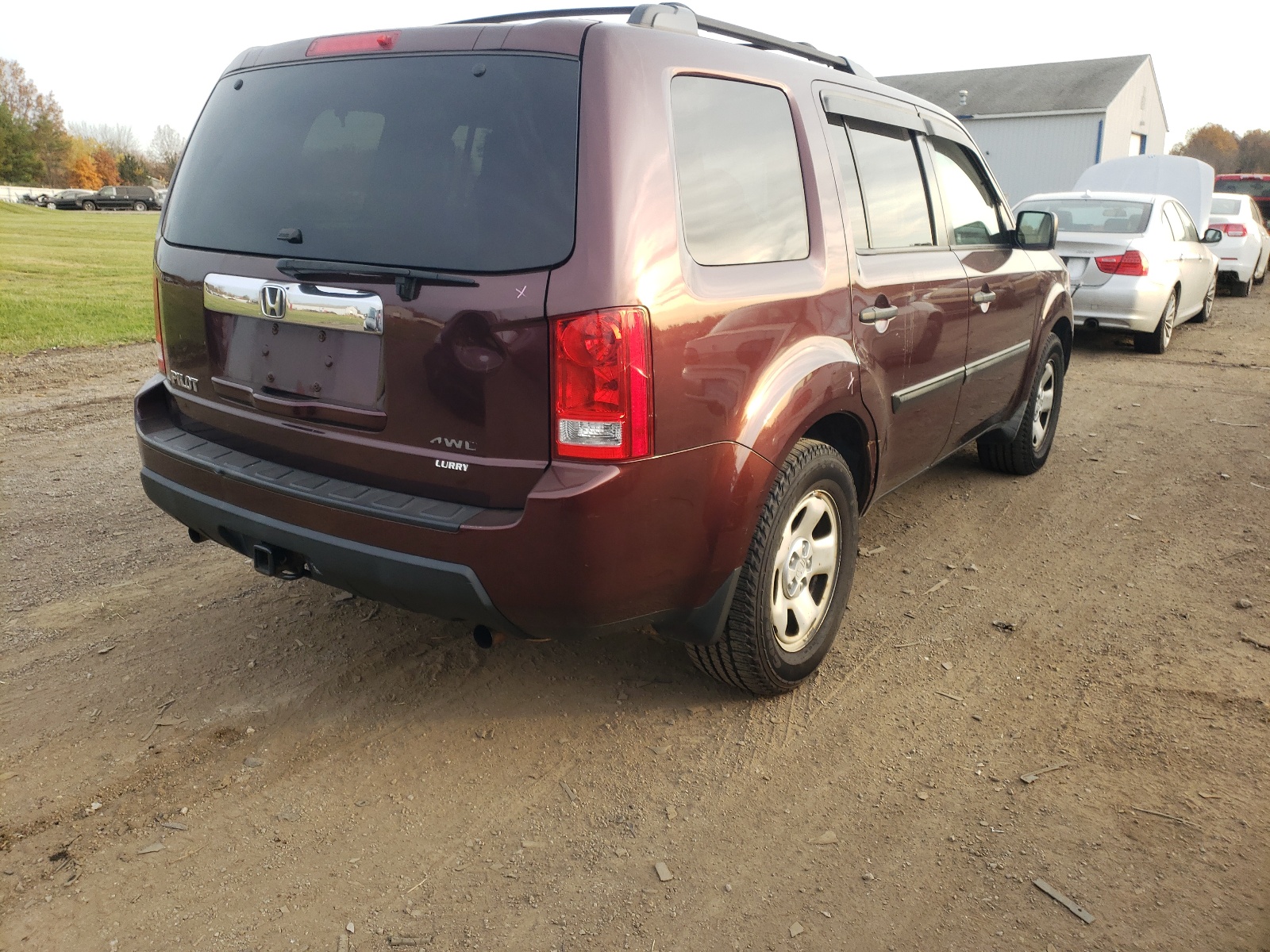 Photo 4 from auction – 2009 HONDA PILOT LX with VIN 5FNYF48219B054839
