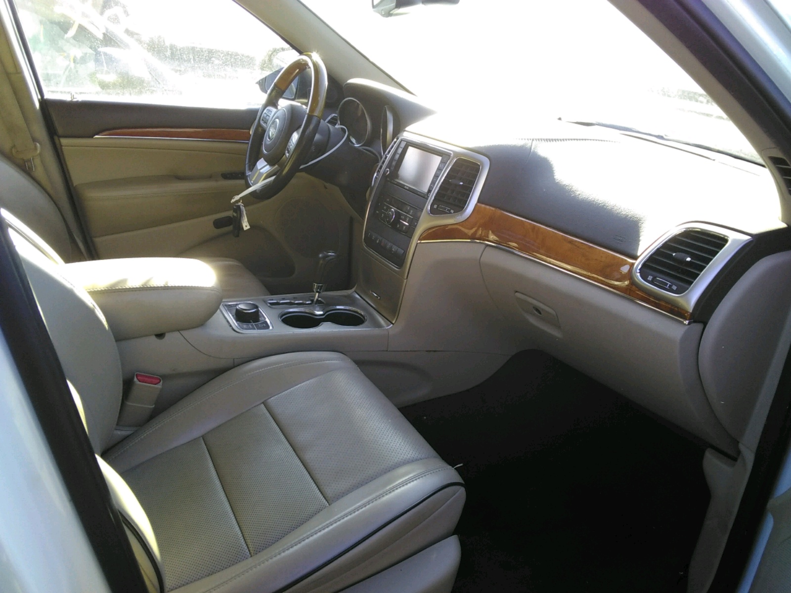 Photo 5 from auction – 2011 JEEP GRAND CHER with VIN 1J4RR6GT9BC560255