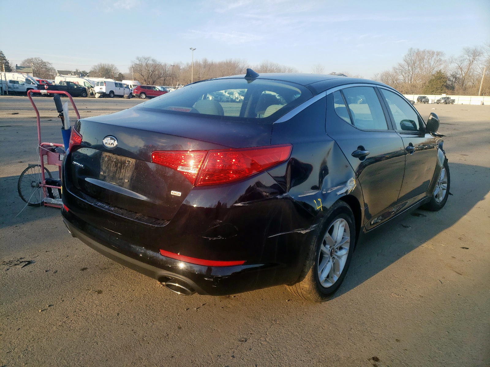 Photo 4 from auction – 2011 KIA OPTIMA LX with VIN KNAGM4A75B5129683