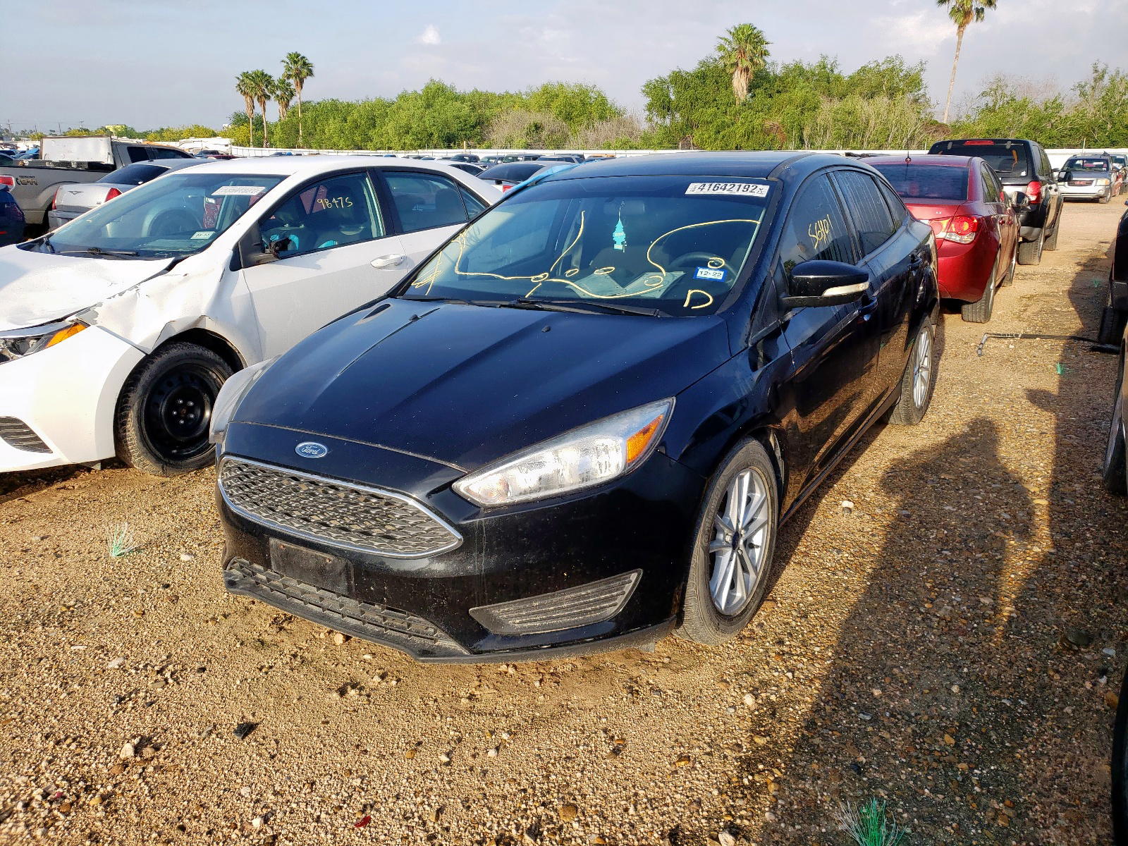 Photo 2 from auction – 2017 FORD FOCUS SE with VIN 1FADP3F22HL318922