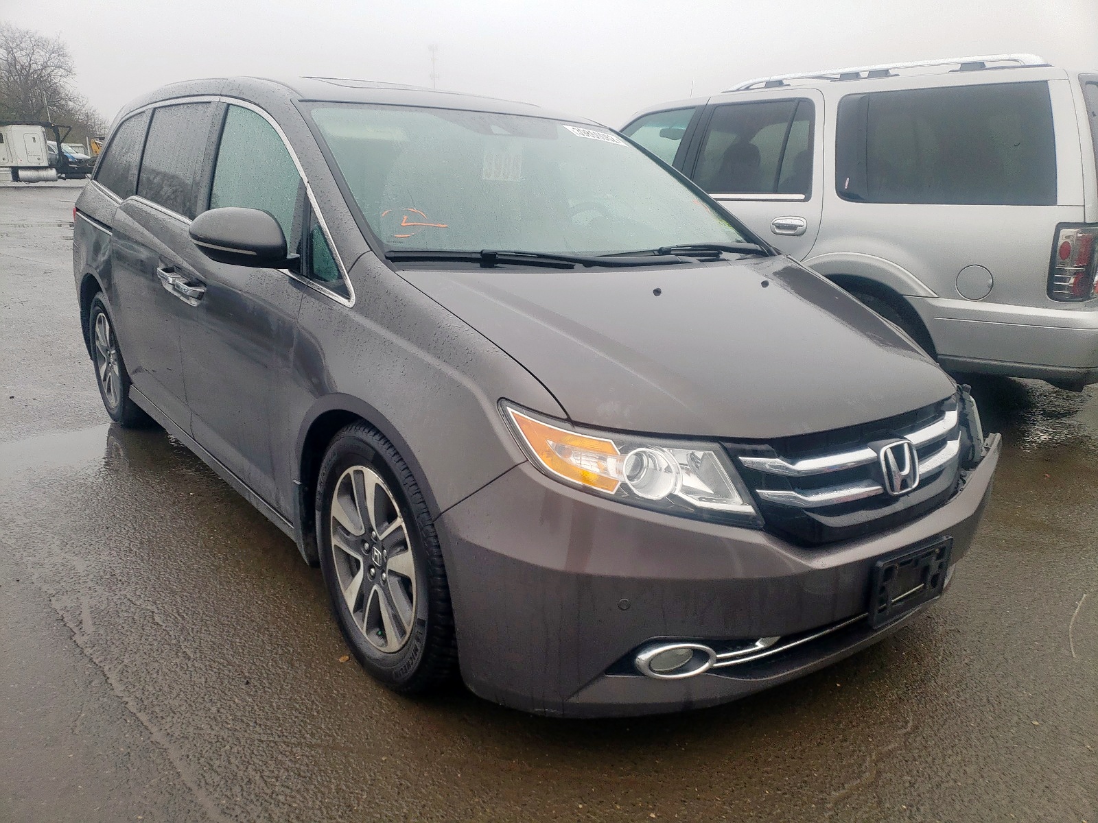 Photo 1 from auction – 2014 HONDA ODYSSEY TO with VIN 5FNRL5H91EB040143