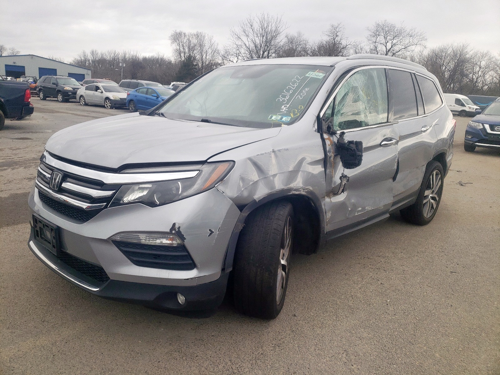 Photo 2 from auction – 2017 HONDA PILOT TOUR with VIN 5FNYF5H93HB009757