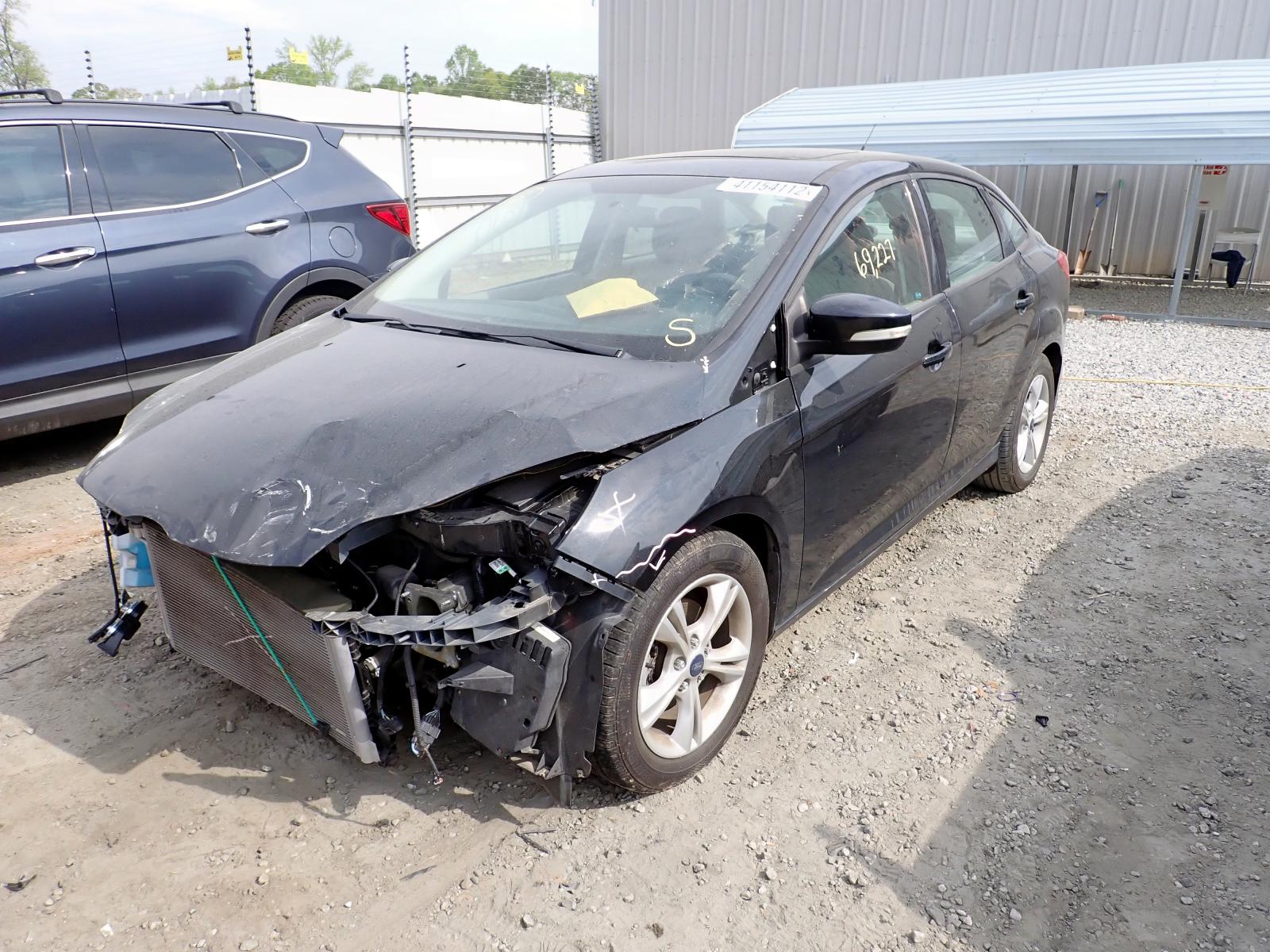 Photo 2 from auction – 2014 FORD FOCUS SE with VIN 1FADP3F21EL435726