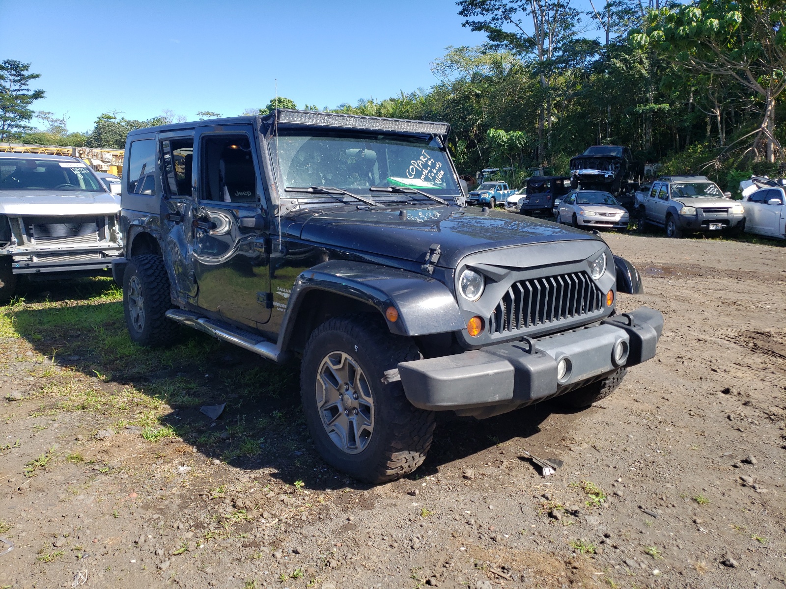 JEEP WRANGLER U 2010 with VIN 1J4HA5H13AL122646 - Photo from auction