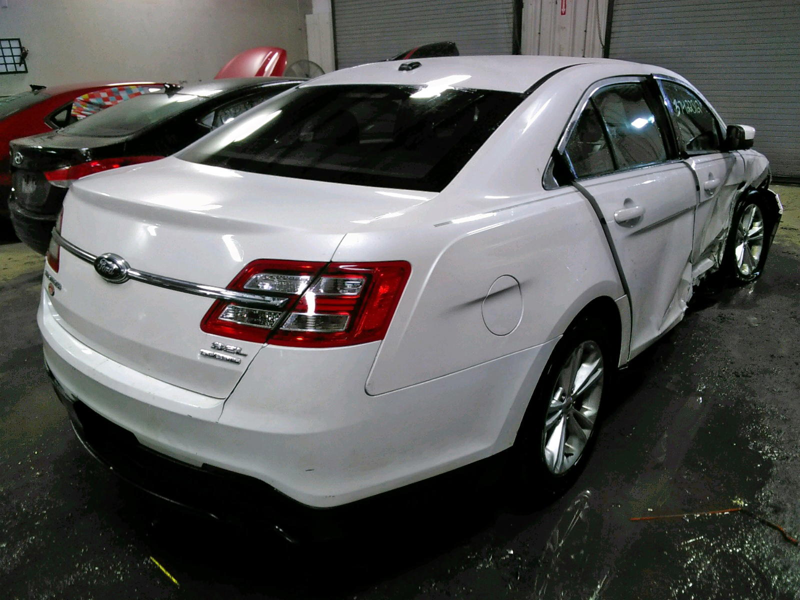Photo 4 from auction – 2013 FORD TAURUS SEL with VIN 1FAHP2E80DG155501