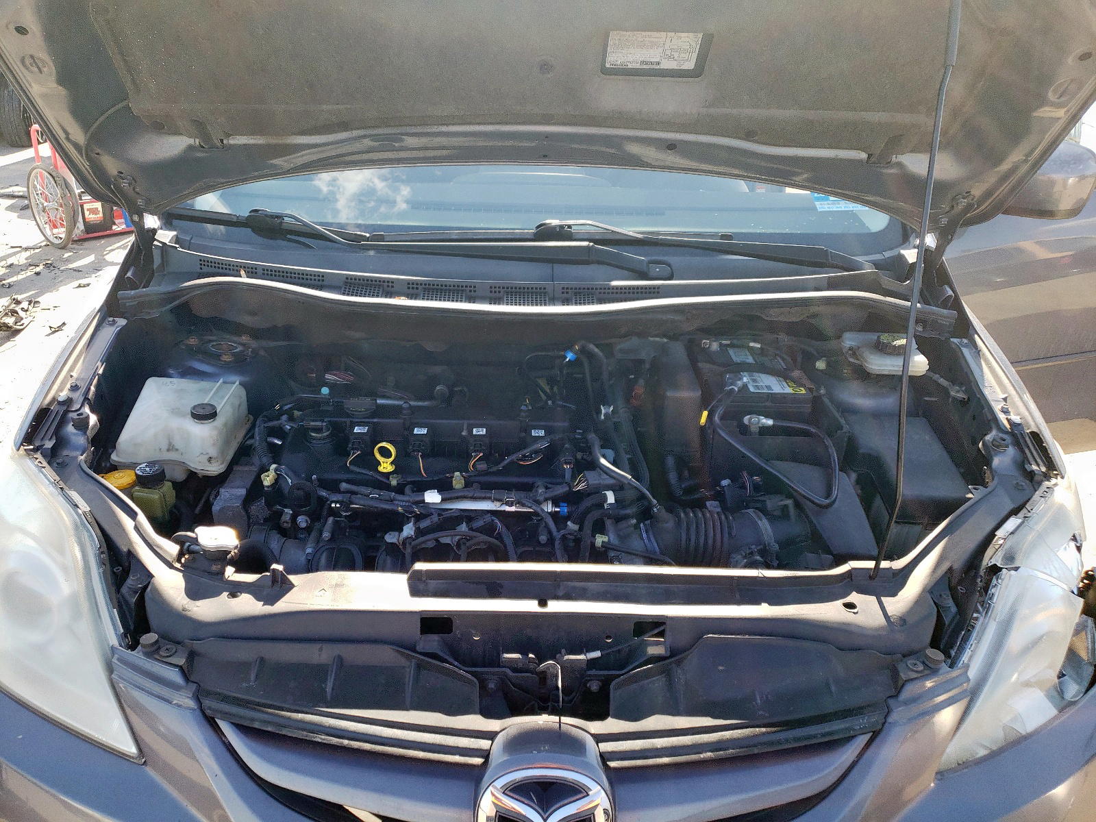 Photo 7 from auction – 2009 MAZDA 5 with VIN JM1CR29L690333635