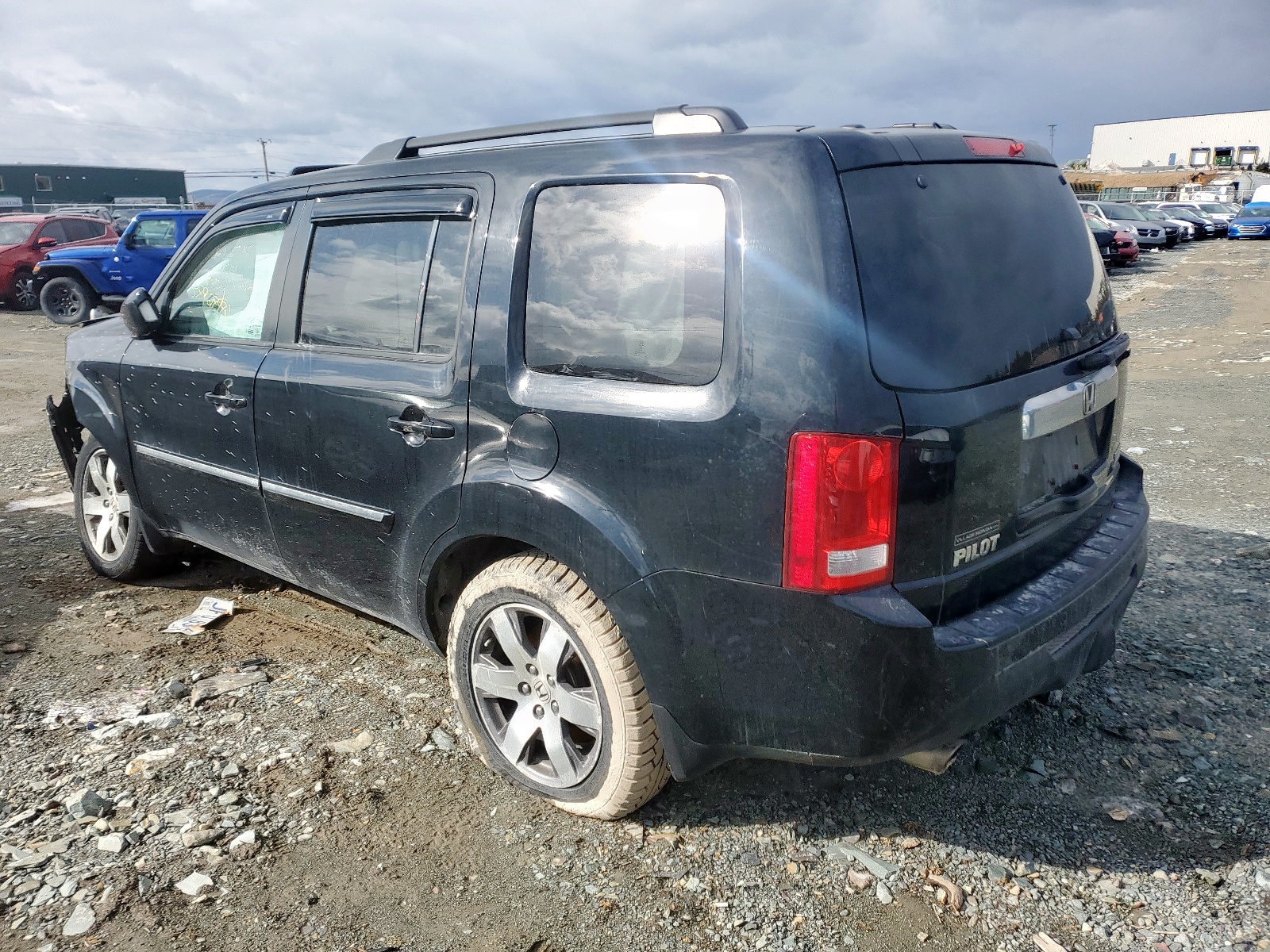 Photo 3 from auction – 2015 HONDA PILOT TOUR with VIN 5FNYF4H95FB504758