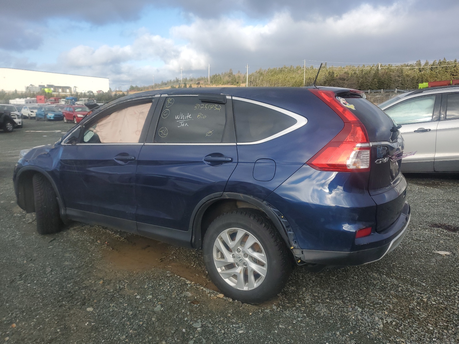 Photo 3 from auction – 2015 HONDA CR-V EX with VIN 2HKRM4H54FH129776