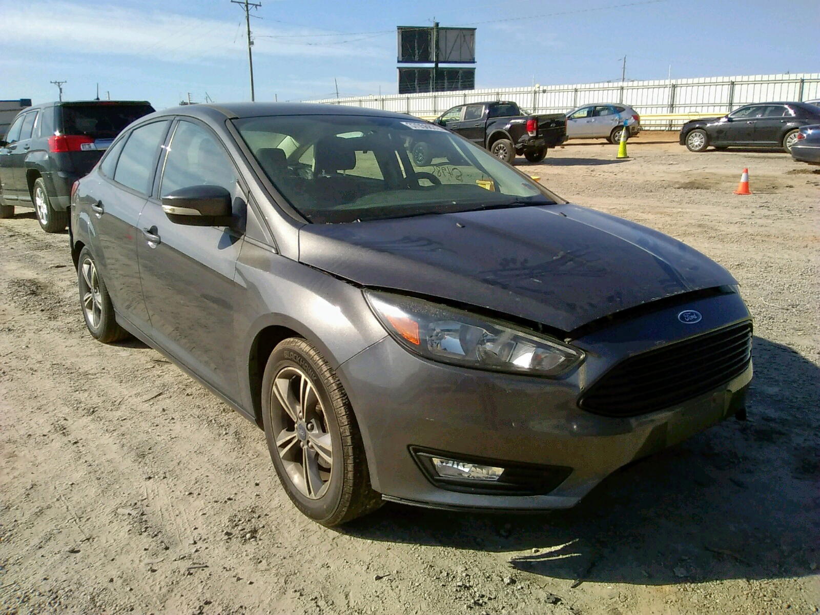 FORD FOCUS SE 2017 with VIN 1FADP3FE9HL282561 - Photo from auction