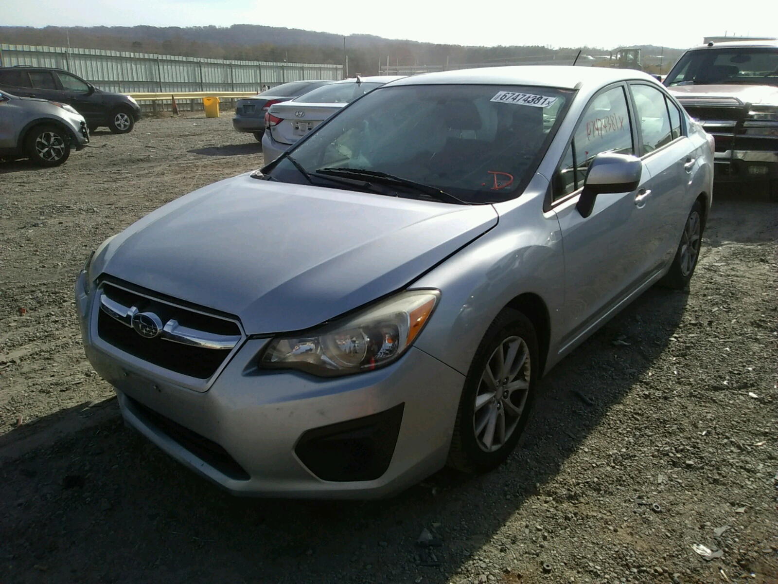 Photo 2 from auction – 2012 SUBARU IMPREZA PR with VIN JF1GJAC63CG010119